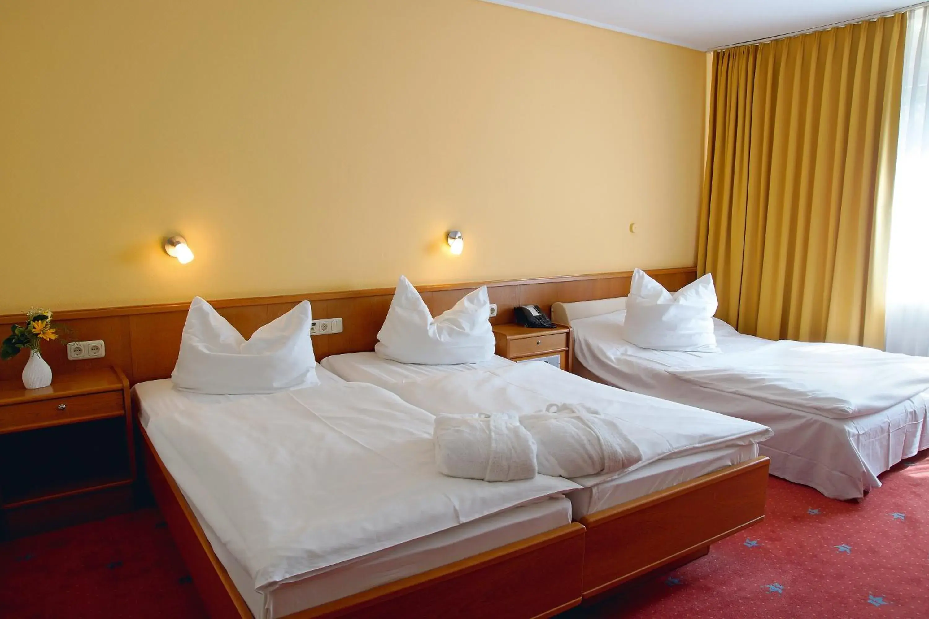 Triple Room in AVALON Hotelpark Königshof Triple Room in AVALON Hotelpark Königshof