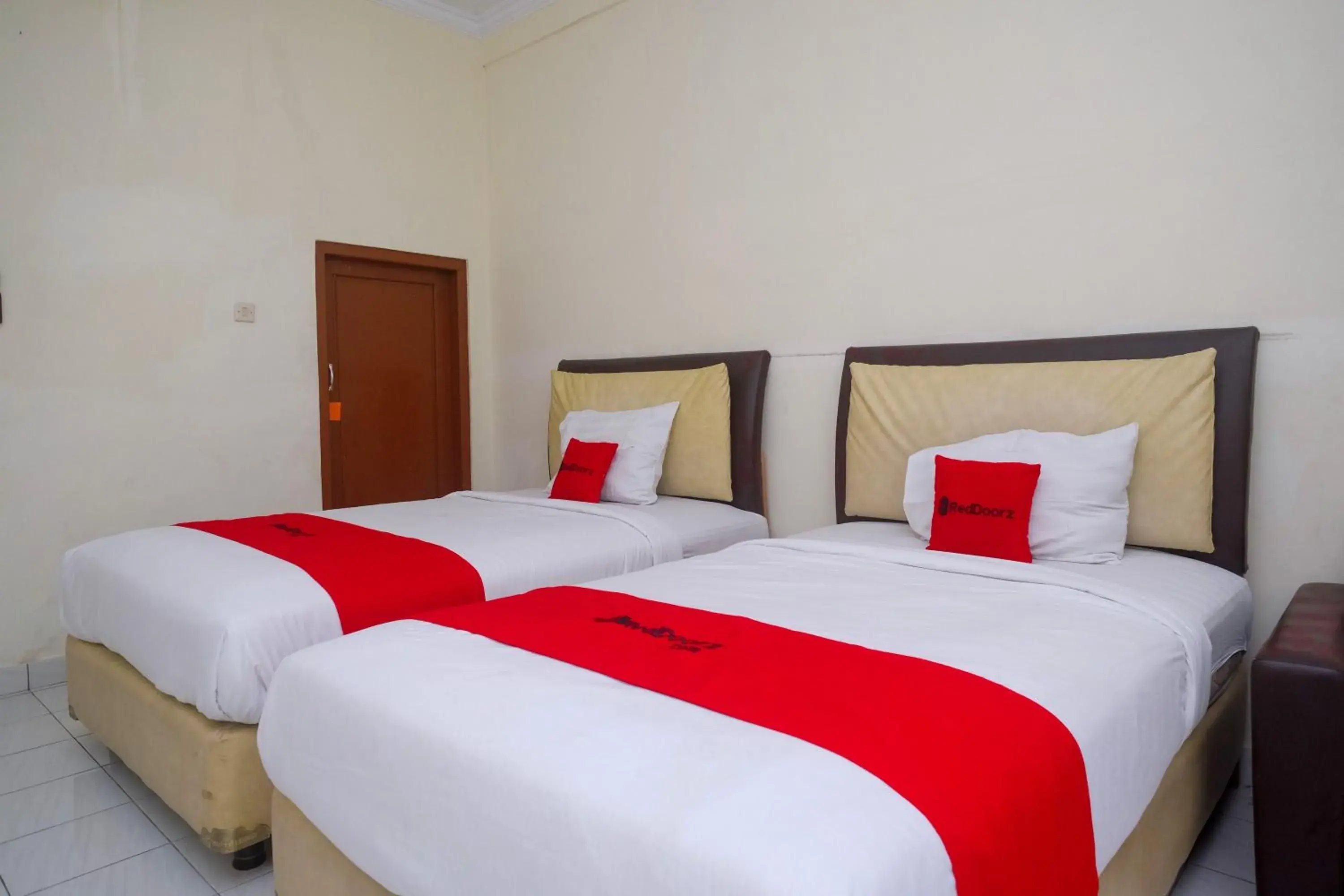 Bed in RedDoorz Syariah near Alun Alun Wonosari Bed in RedDoorz Syariah near Alun Alun Wonosari