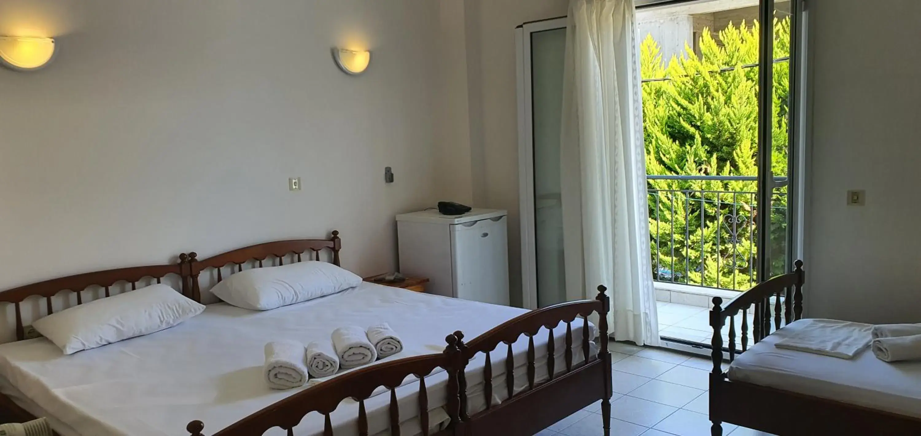 Triple Room with Garden View in Artemis Hotel Triple Room with Garden View in Artemis Hotel