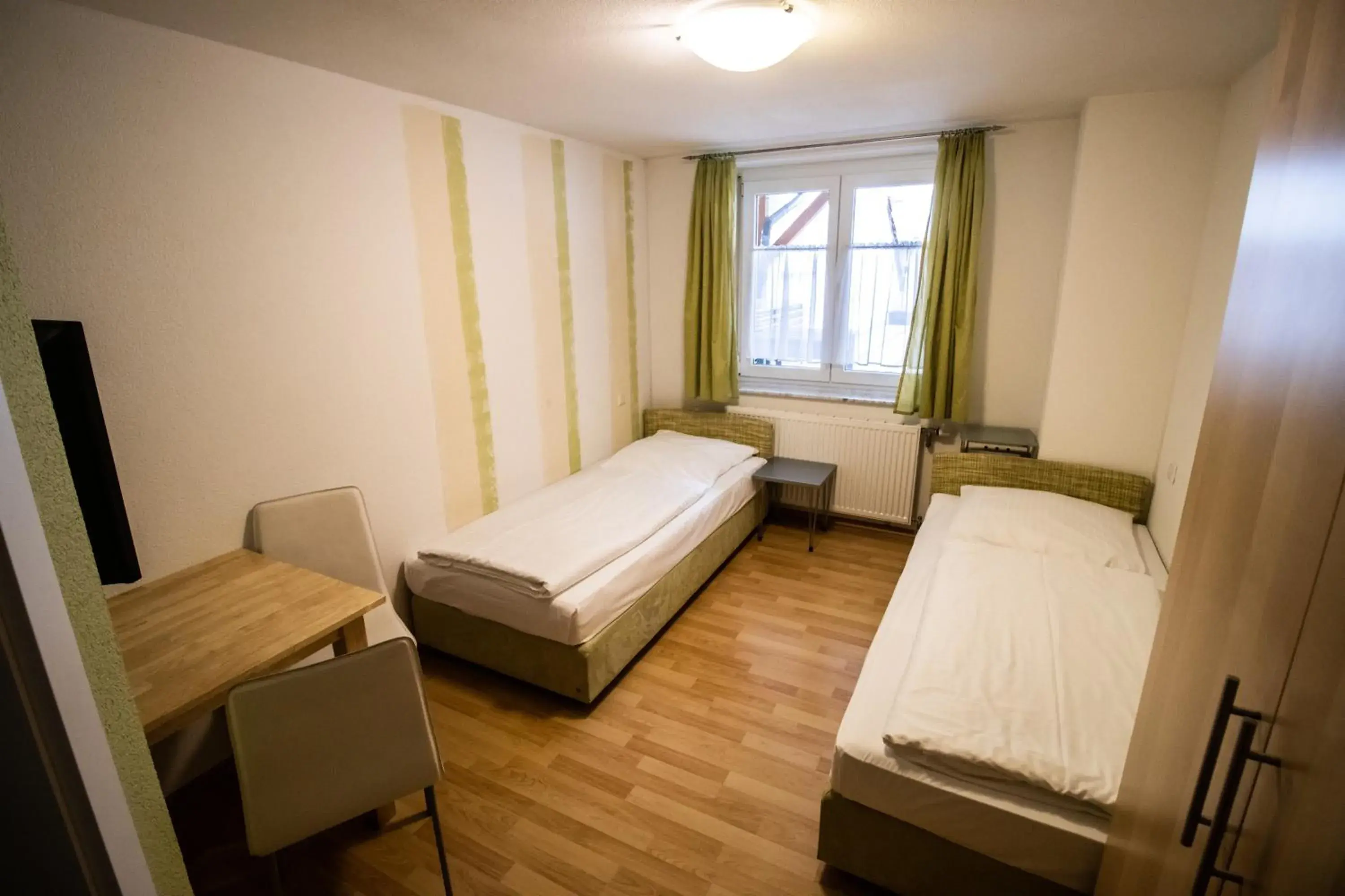 Twin Room with Bathroom - single occupancy in Hotel Gasthof Rössle Twin Room with Bathroom - single occupancy in Hotel Gasthof Rössle