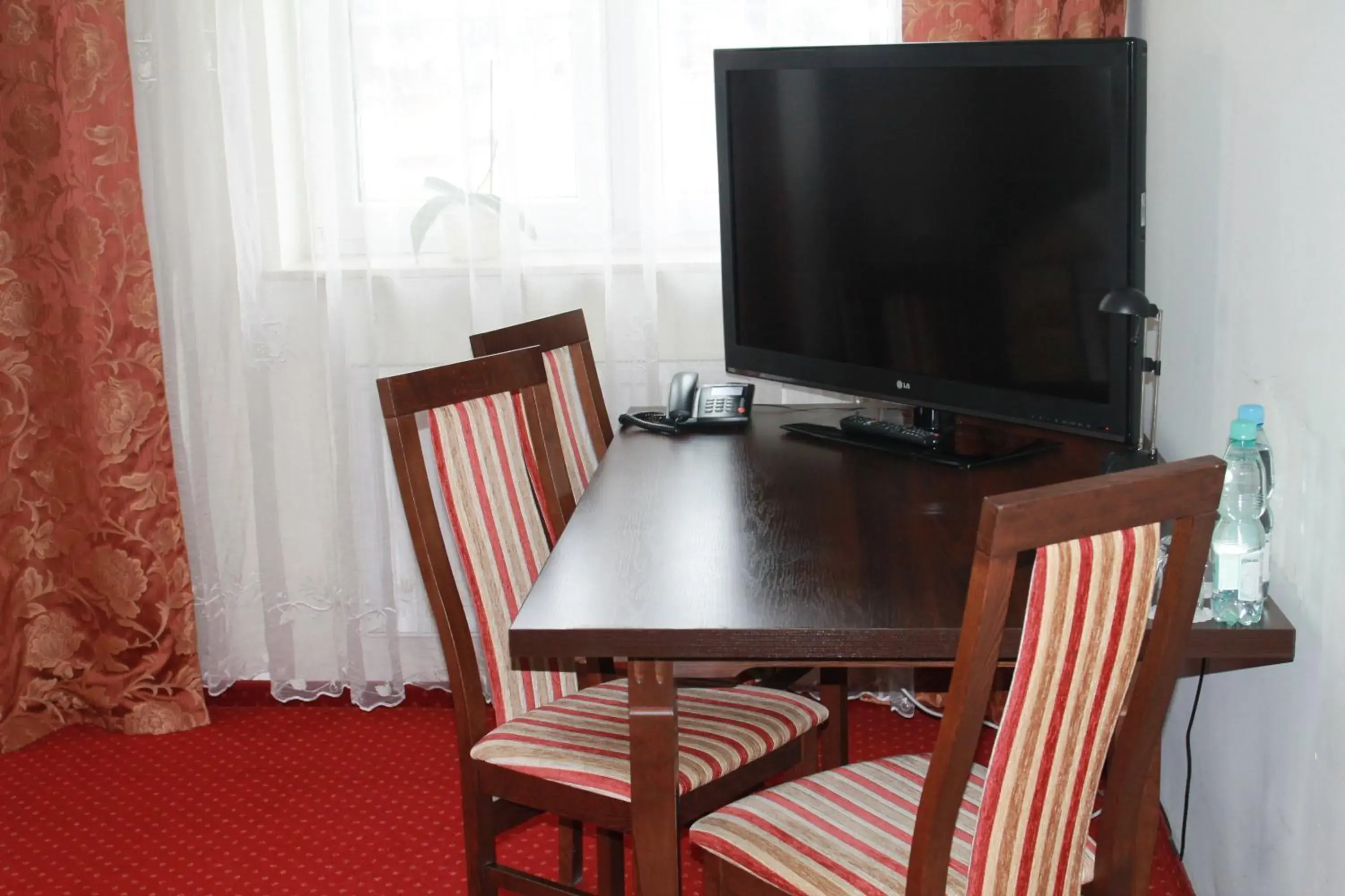 Economy Triple Room in Hotel Kaprys Economy Triple Room in Hotel Kaprys