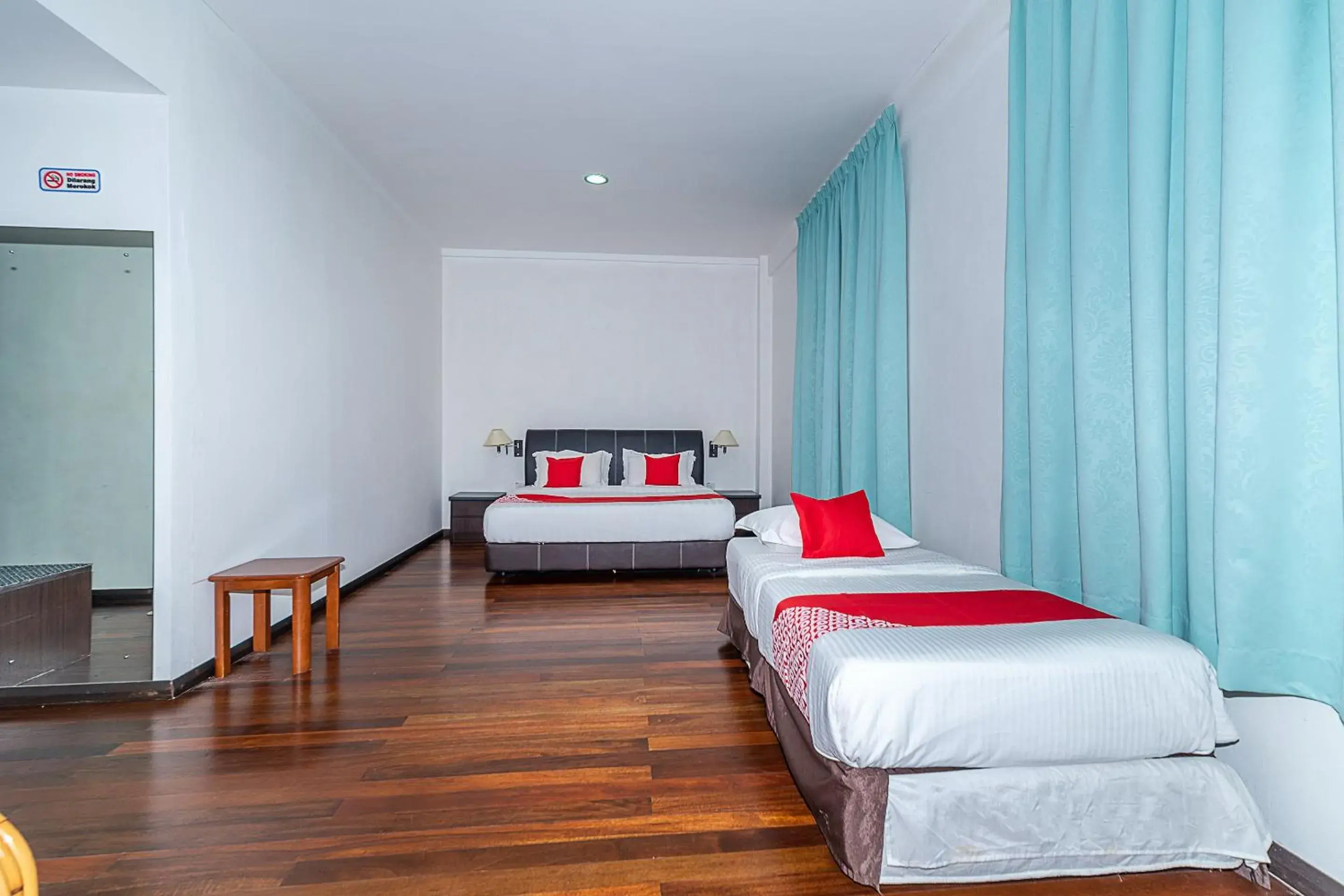 Deluxe Triple Room in Hotel O Eagle Wood Garden Deluxe Triple Room in Hotel O Eagle Wood Garden