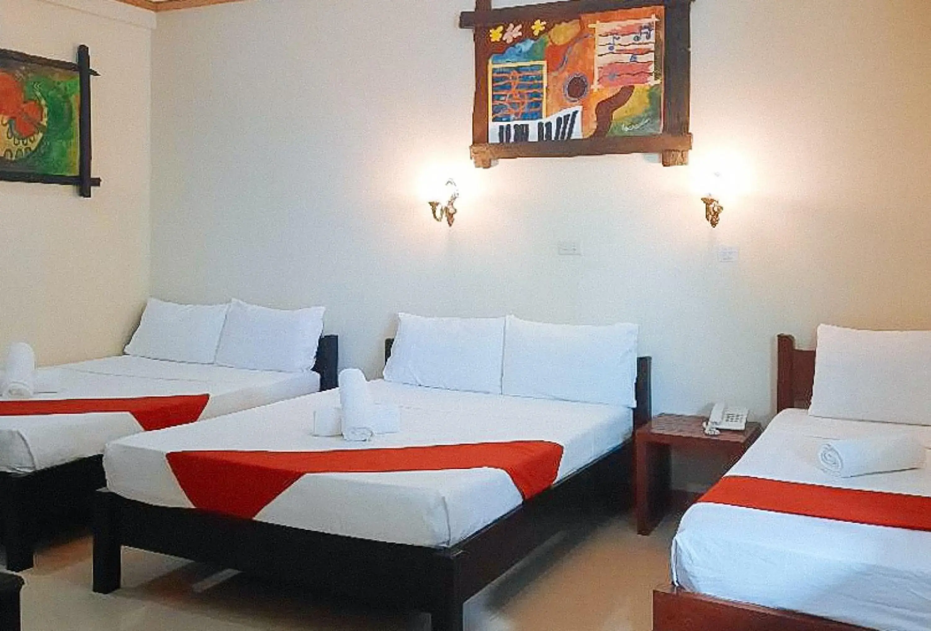 Family Double Room in RedDoorz at New Casamila Hotel Palawan Family Double Room in RedDoorz at New Casamila Hotel Palawan