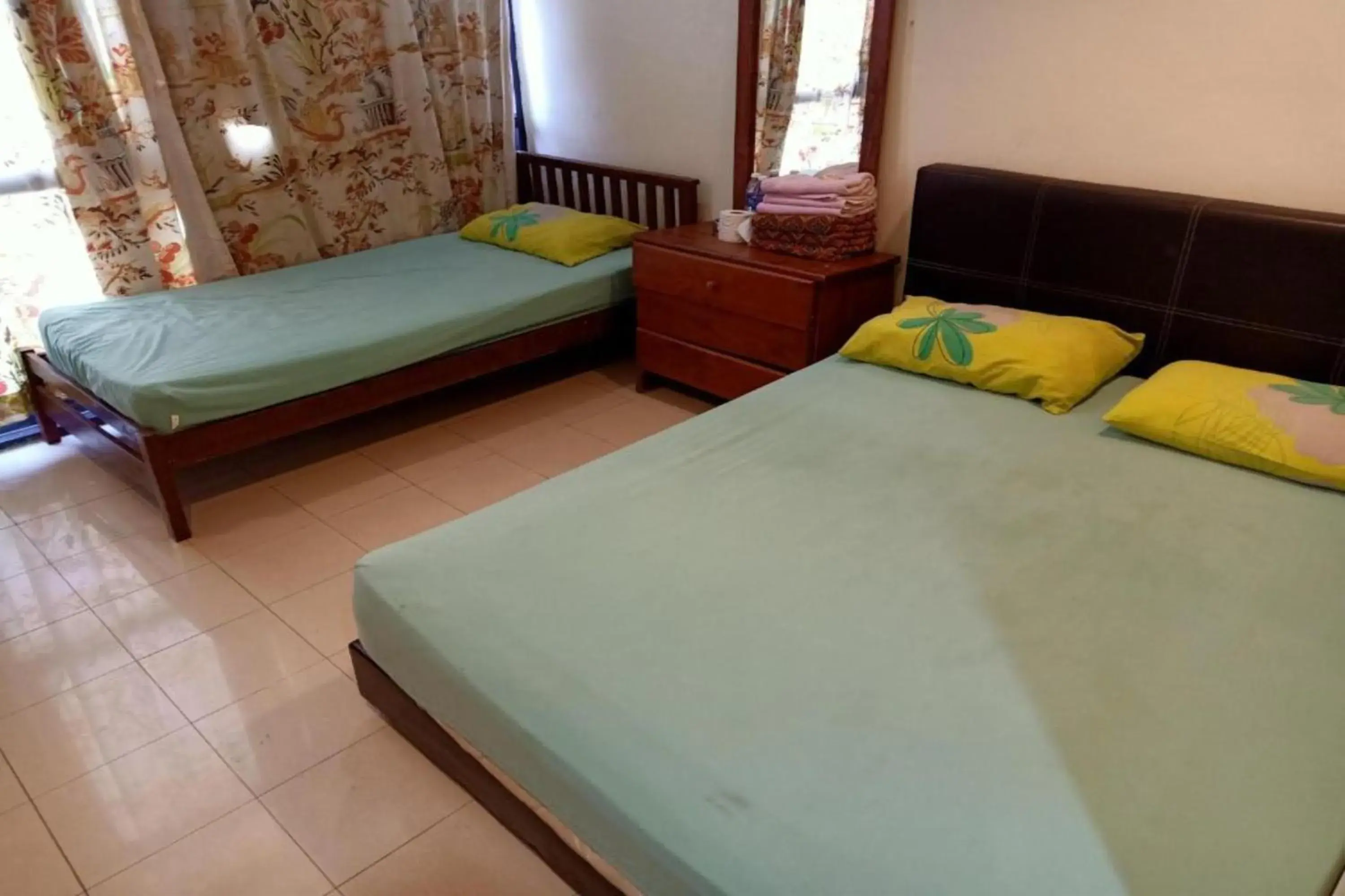 Deluxe Triple Room in Hotel O Prai Jaya Deluxe Triple Room in Hotel O Prai Jaya