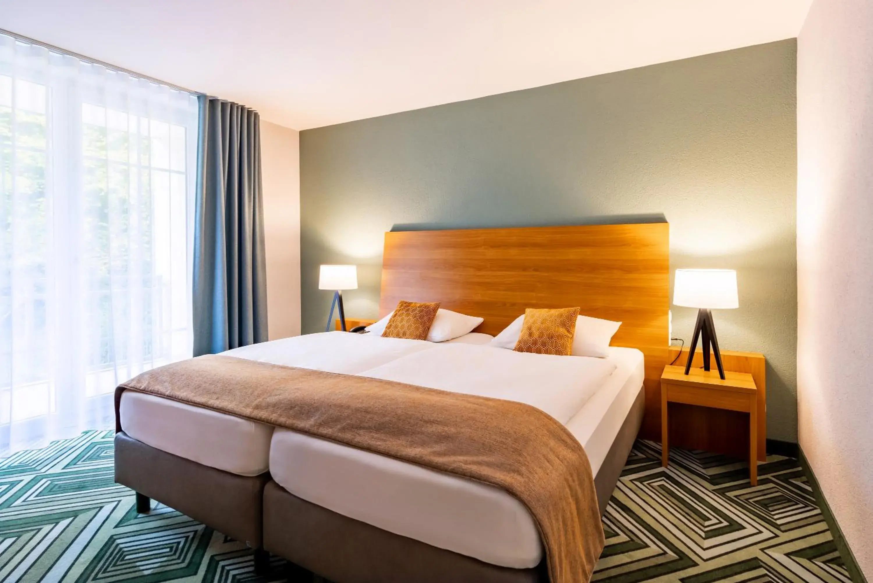 Deluxe Twin Room with Balcony in Best Western Plus Parkhotel Maximilian Ottobeuren Deluxe Twin Room with Balcony in Best Western Plus Parkhotel Maximilian Ottobeuren