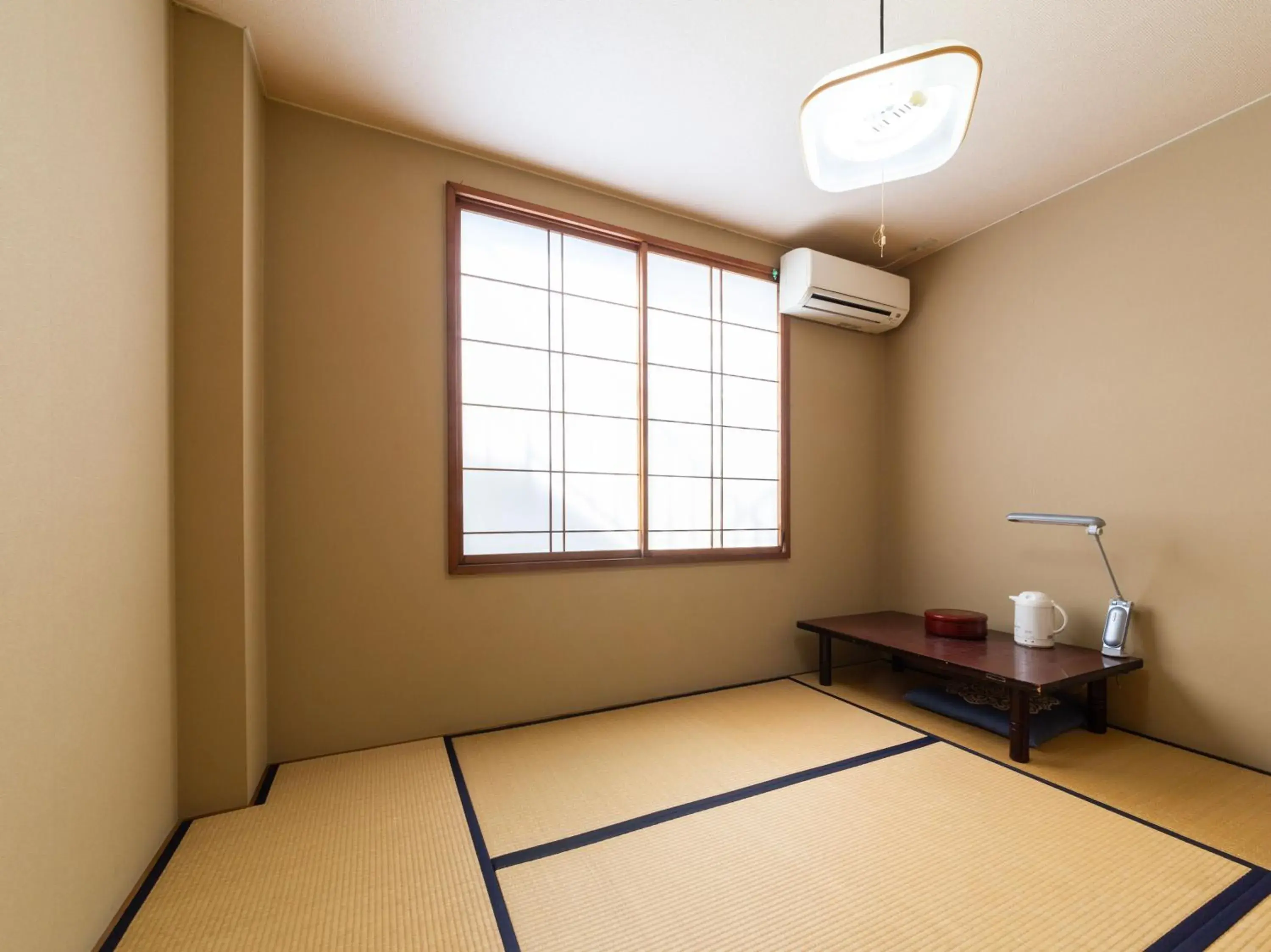 Triple Room with Shared Bathroom - single occupancy in Tabist Business Hotel Chitose Kashiwazaki Triple Room with Shared Bathroom - single occupancy in Tabist Business Hotel Chitose Kashiwazaki