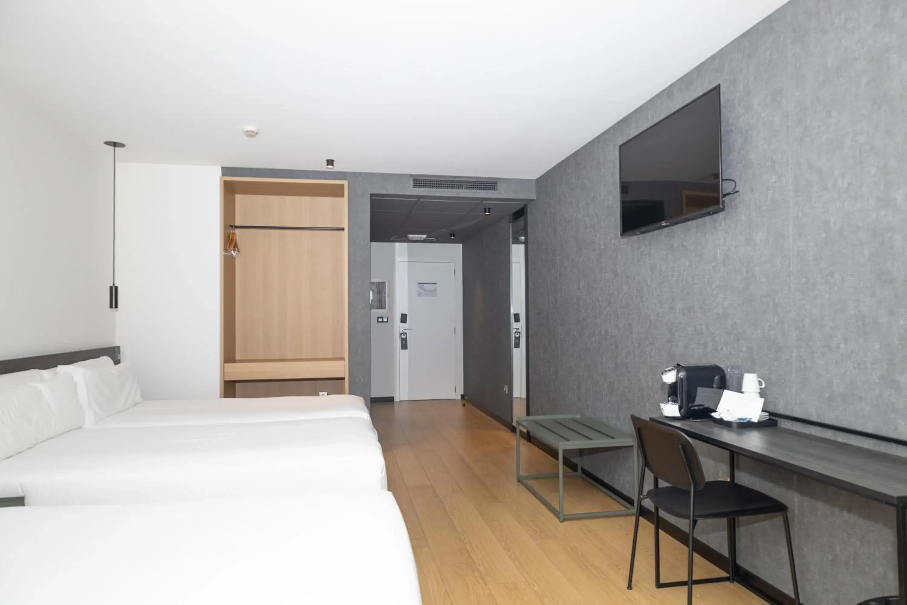 Triple Room in Hotel Forum Ceao Triple Room in Hotel Forum Ceao