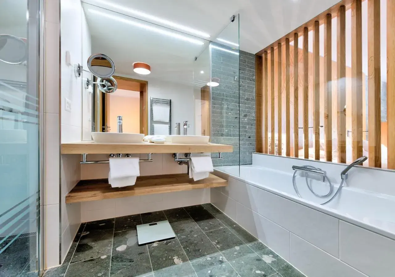 Two Connecting Deluxe Rooms - single occupancy in Hôtel des Bains de Saillon Two Connecting Deluxe Rooms - single occupancy in Hôtel des Bains de Saillon