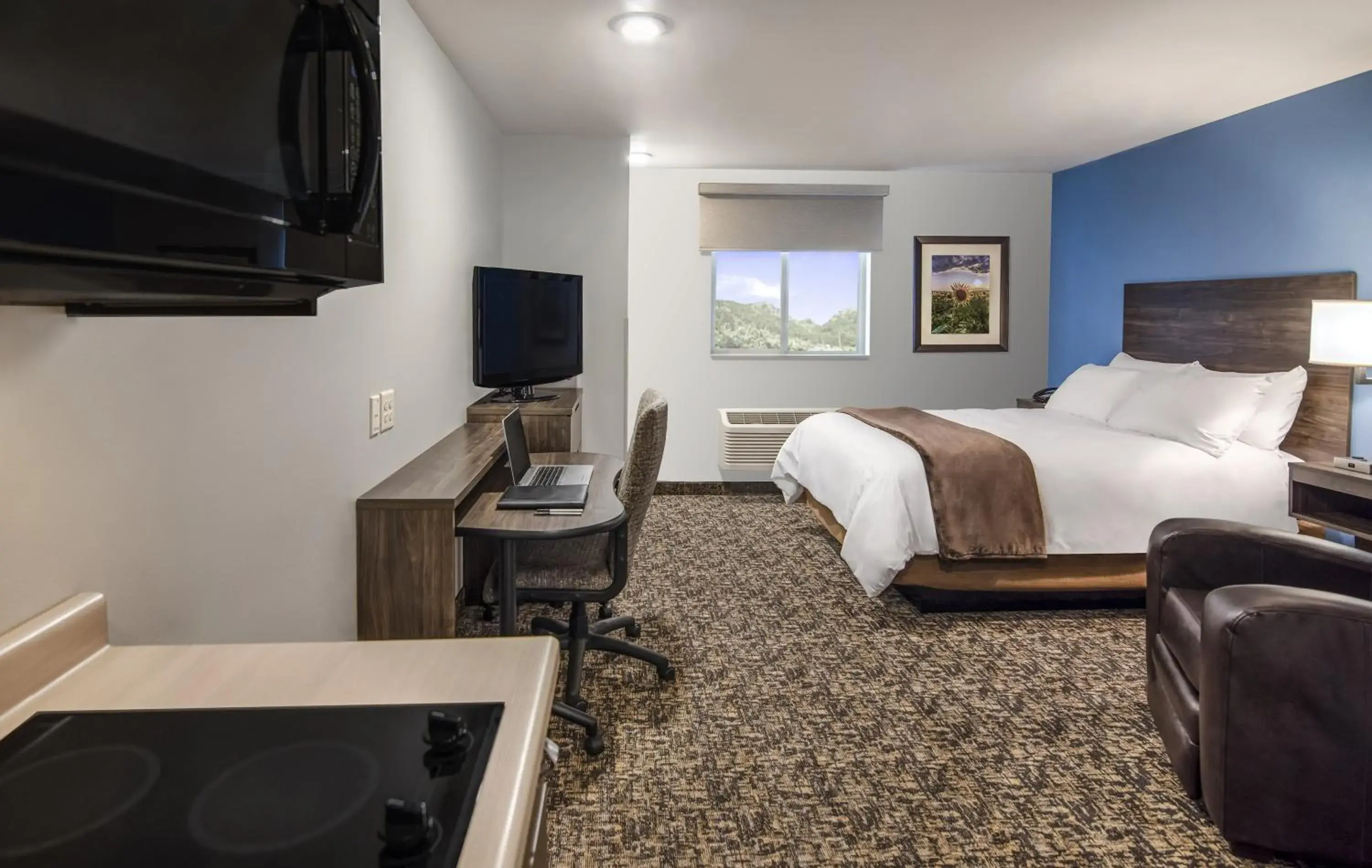 King Room - Recliner - Hearing & Mobility Accessible - Roll In Shower in My Place Hotel-Moab, UT King Room - Recliner - Hearing & Mobility Accessible - Roll In Shower in My Place Hotel-Moab, UT