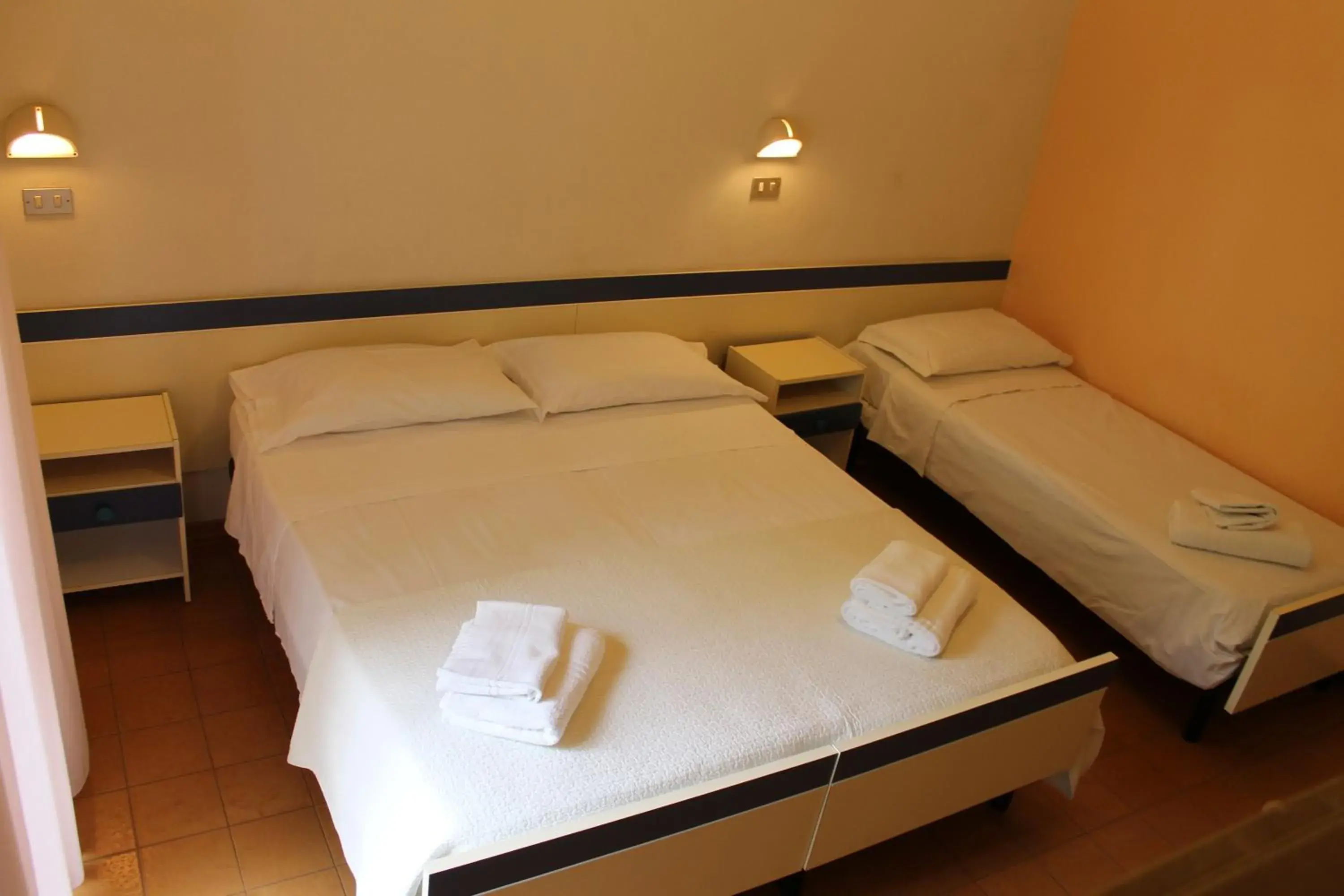 Triple Room with Balcony in Hotel Residence Ponente Triple Room with Balcony in Hotel Residence Ponente