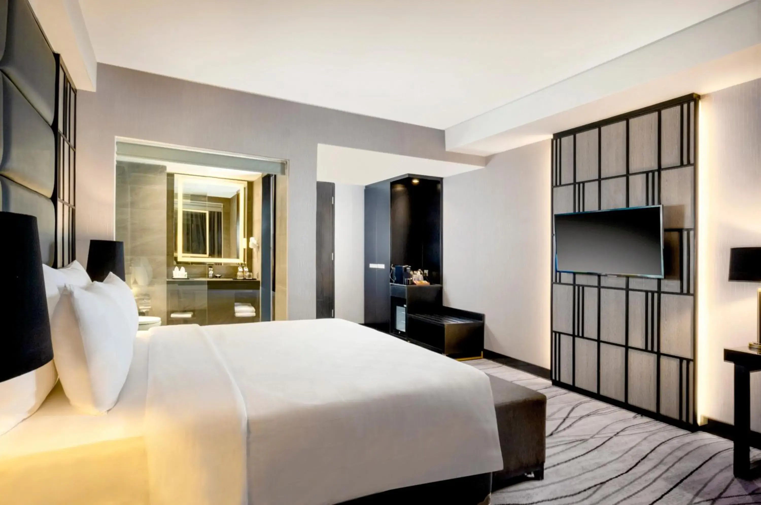 Deluxe King Room in Grand Swiss-Belhotel Darmo Deluxe King Room in Grand Swiss-Belhotel Darmo