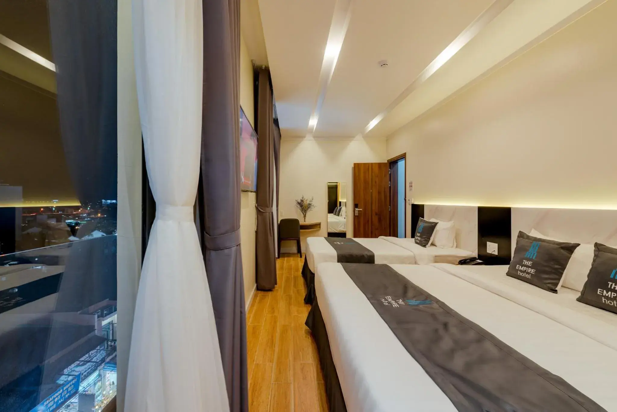 Triple Room with City View in The Empire Hotel Triple Room with City View in The Empire Hotel