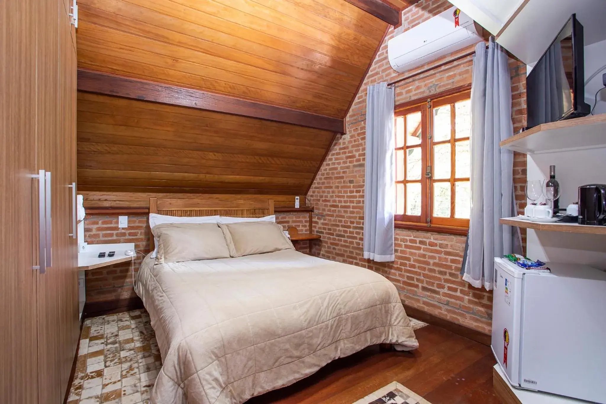 Standard Quadruple Room - Not Pet Friendly in Pousada Suiça Mineira Garden Standard Quadruple Room - Not Pet Friendly in Pousada Suiça Mineira Garden