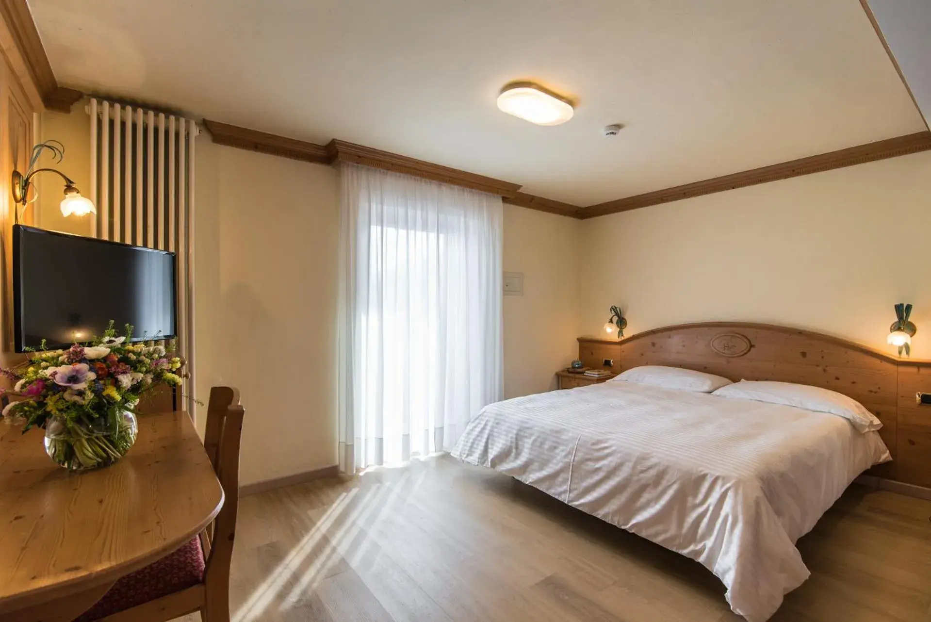 Triple Room with Balcony in Hotel Colfosco Triple Room with Balcony in Hotel Colfosco