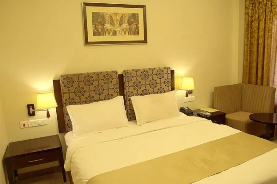 Queen Room in Pramod Convention & Club Resort Queen Room in Pramod Convention & Club Resort