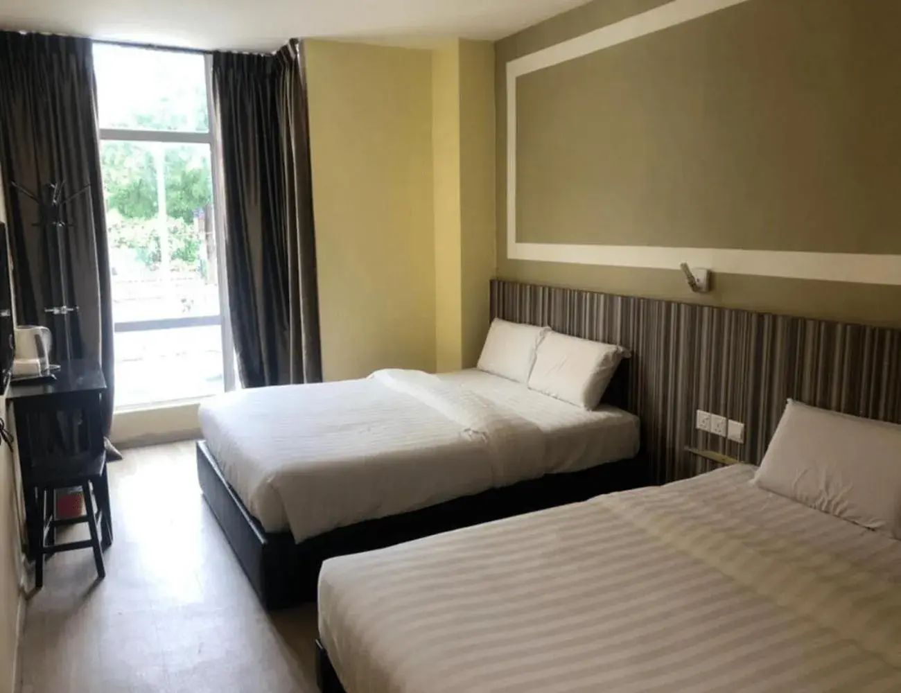 Queen Room with Two Queen Beds in Sun Inns Hotel Ayer Keroh Queen Room with Two Queen Beds in Sun Inns Hotel Ayer Keroh