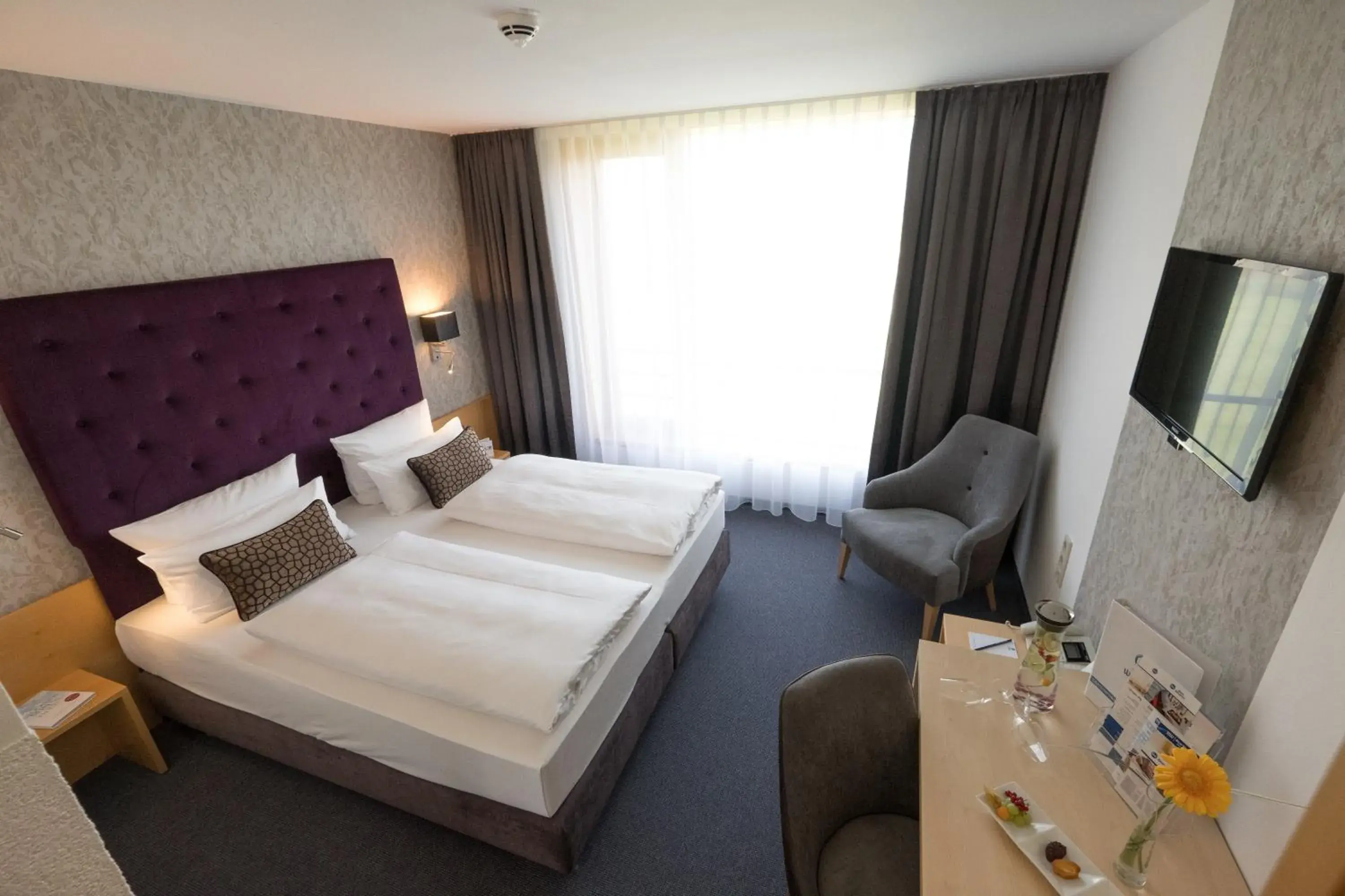 Standard Triple Room in rugs Hotel am Schlosspark Lichtenwalde Standard Triple Room in rugs Hotel am Schlosspark Lichtenwalde