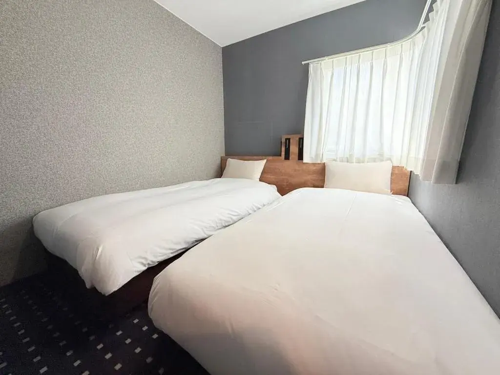 Deluxe Twin Room - Non-Smoking in hotel the textile Deluxe Twin Room - Non-Smoking in hotel the textile