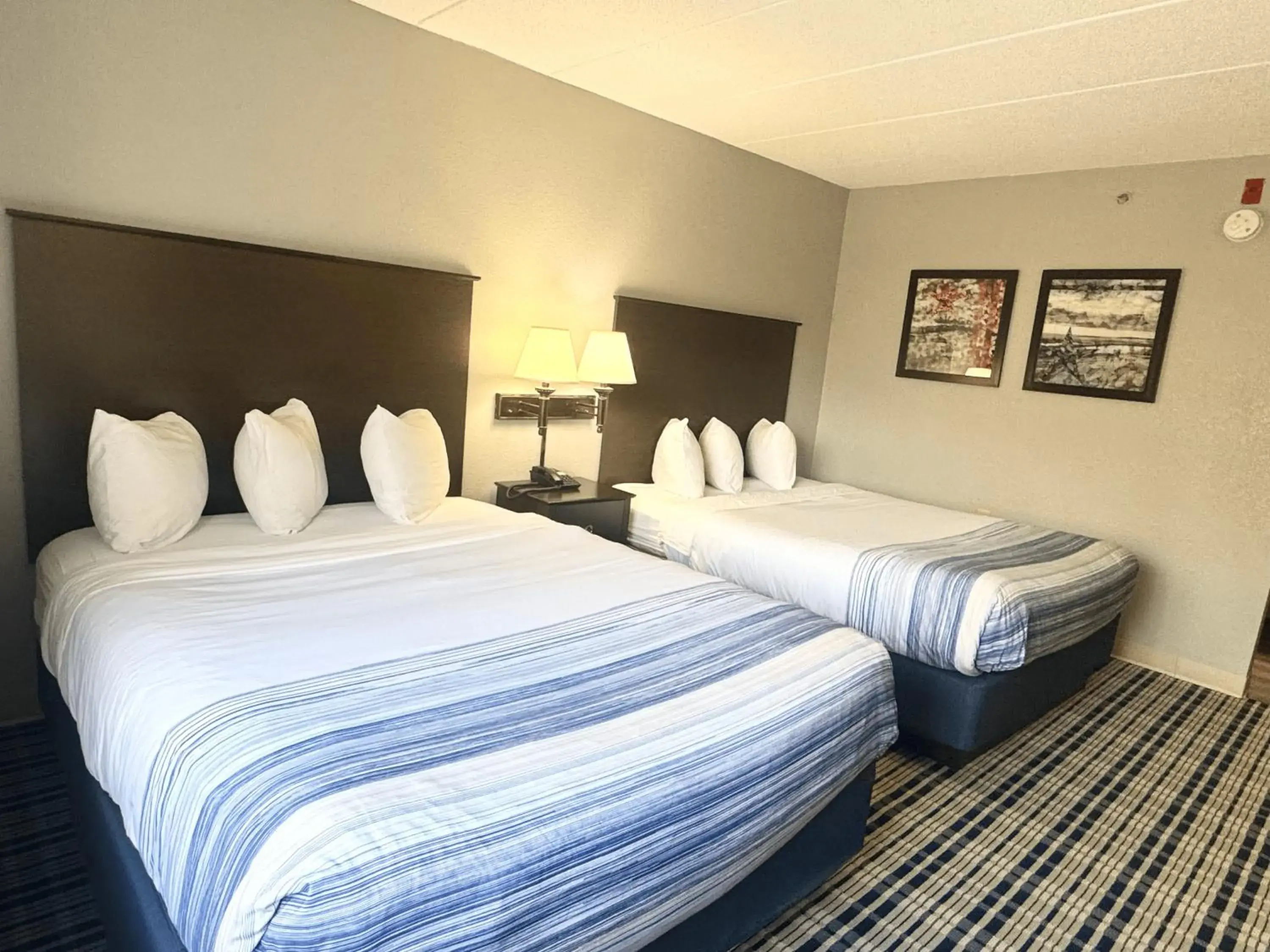 Queen Room with Two Queen Beds - Non-Smoking in AmericInn by Wyndham Ames Queen Room with Two Queen Beds - Non-Smoking in AmericInn by Wyndham Ames