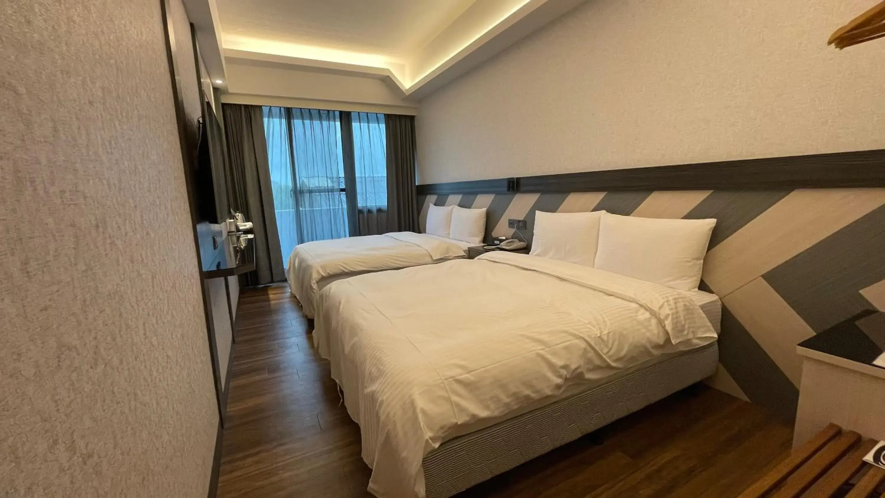 Quadruple Room with Balcony in Weifeng Boutique Business Hotel - Zhanqian Branch Quadruple Room with Balcony in Weifeng Boutique Business Hotel - Zhanqian Branch