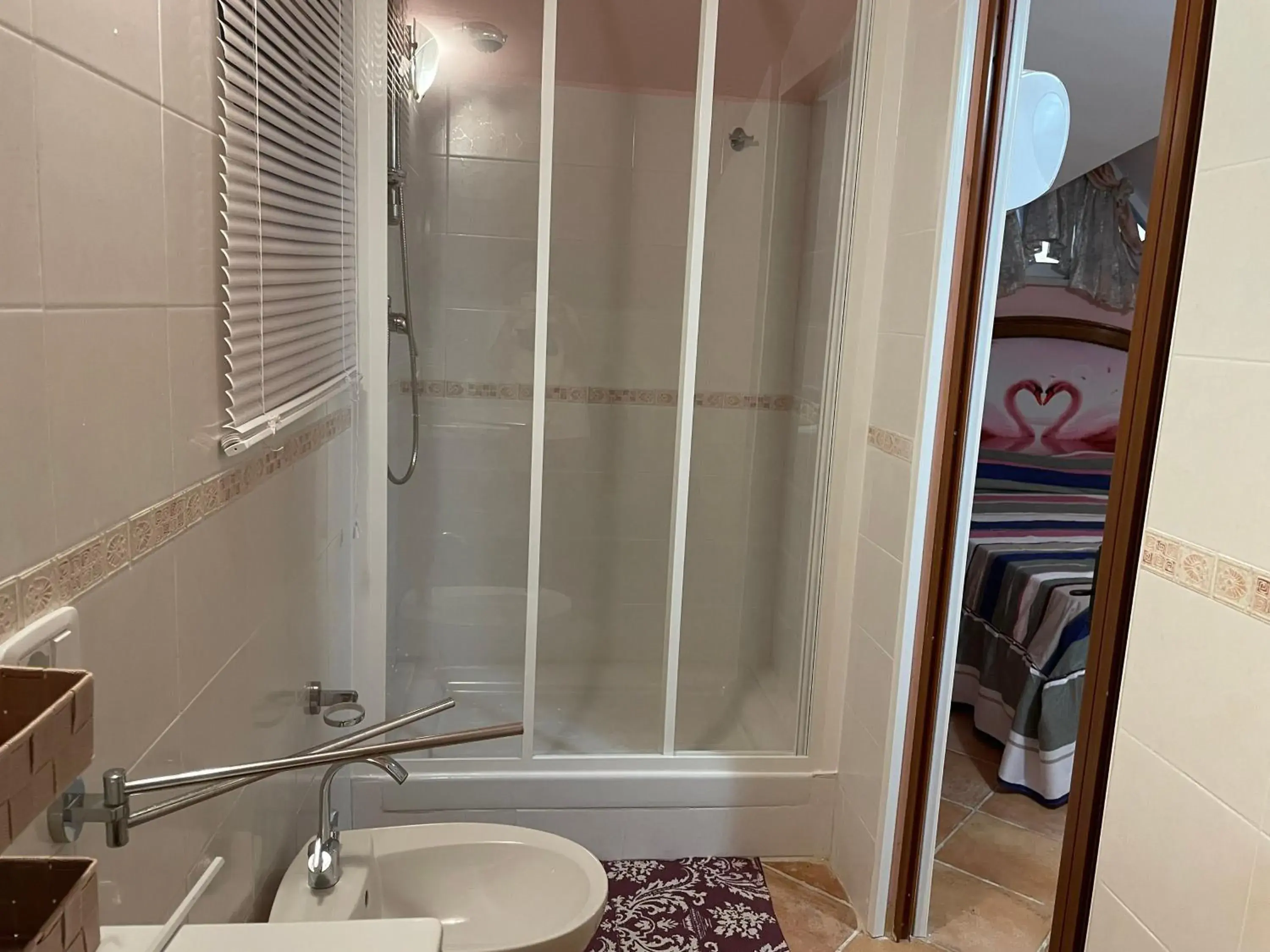 Triple Room with Bathroom - single occupancy in Centro estivo Il Piccolo Paradiso Triple Room with Bathroom - single occupancy in Centro estivo Il Piccolo Paradiso