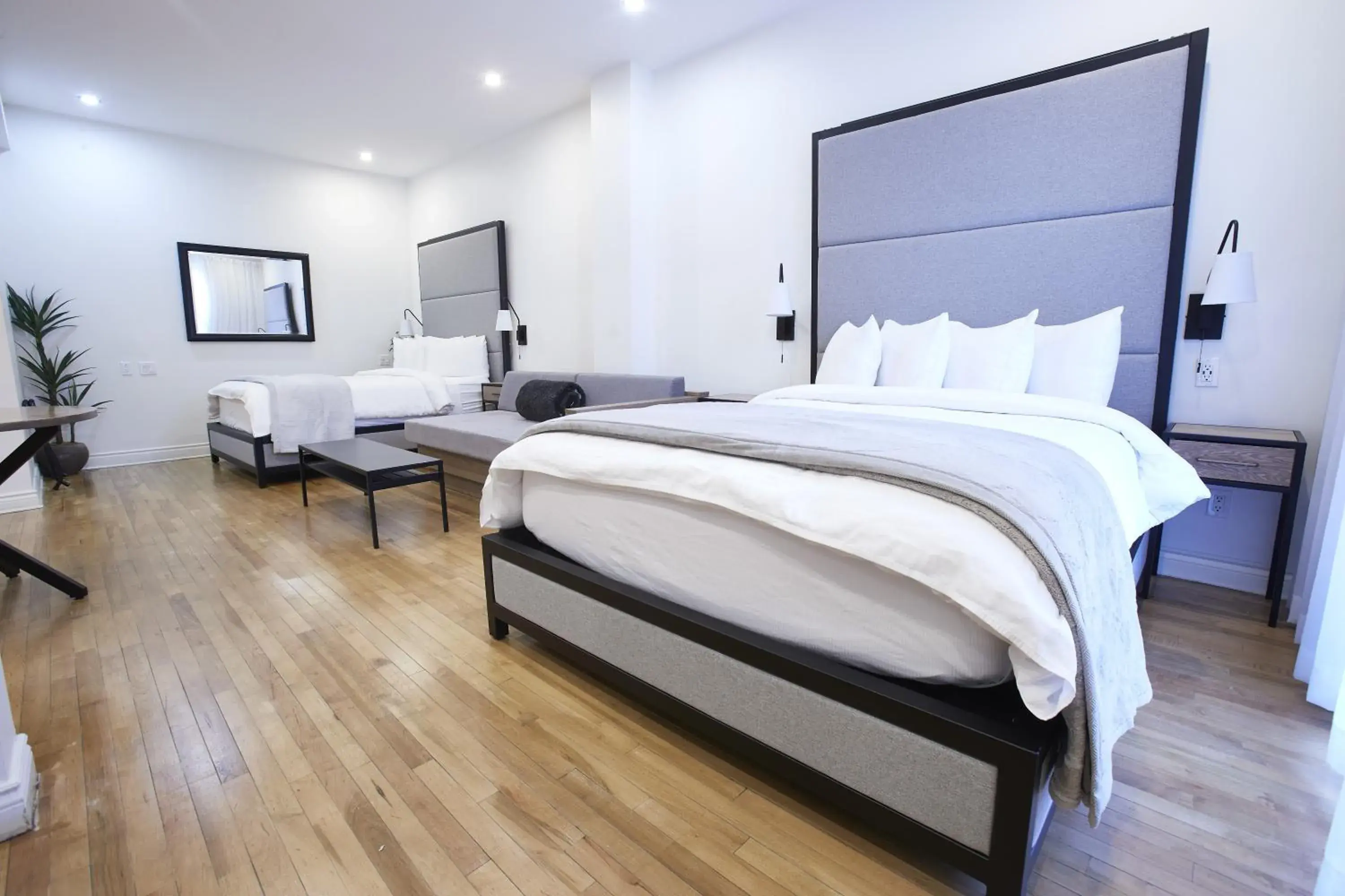 Family Loft with Two Queen Beds and sofa bed in hotel & spa Carré Saint-Louis Family Loft with Two Queen Beds and sofa bed in hotel & spa Carré Saint-Louis