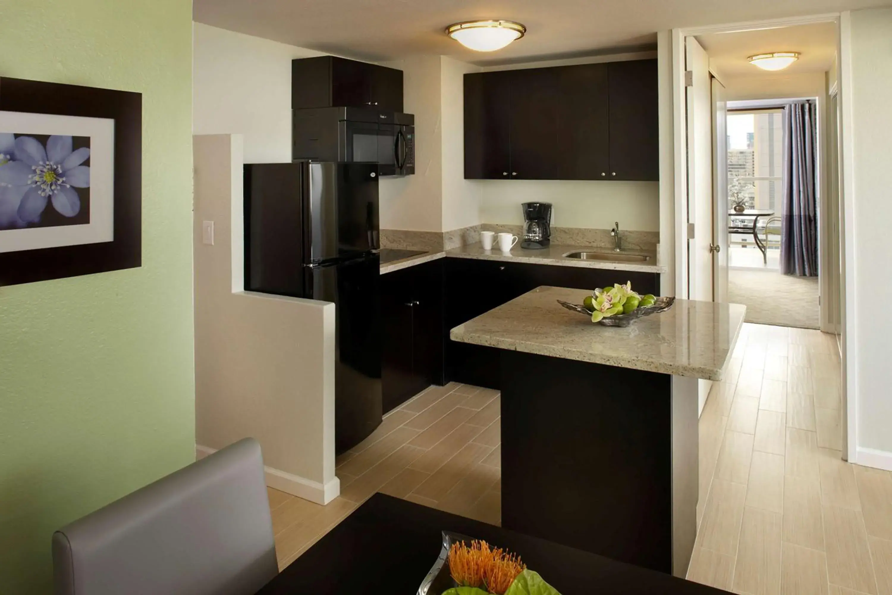 One Bedroom Suite Kitchenette Panoramic City View in Skyline Island Colony Hotel One Bedroom Suite Kitchenette Panoramic City View in Skyline Island Colony Hotel