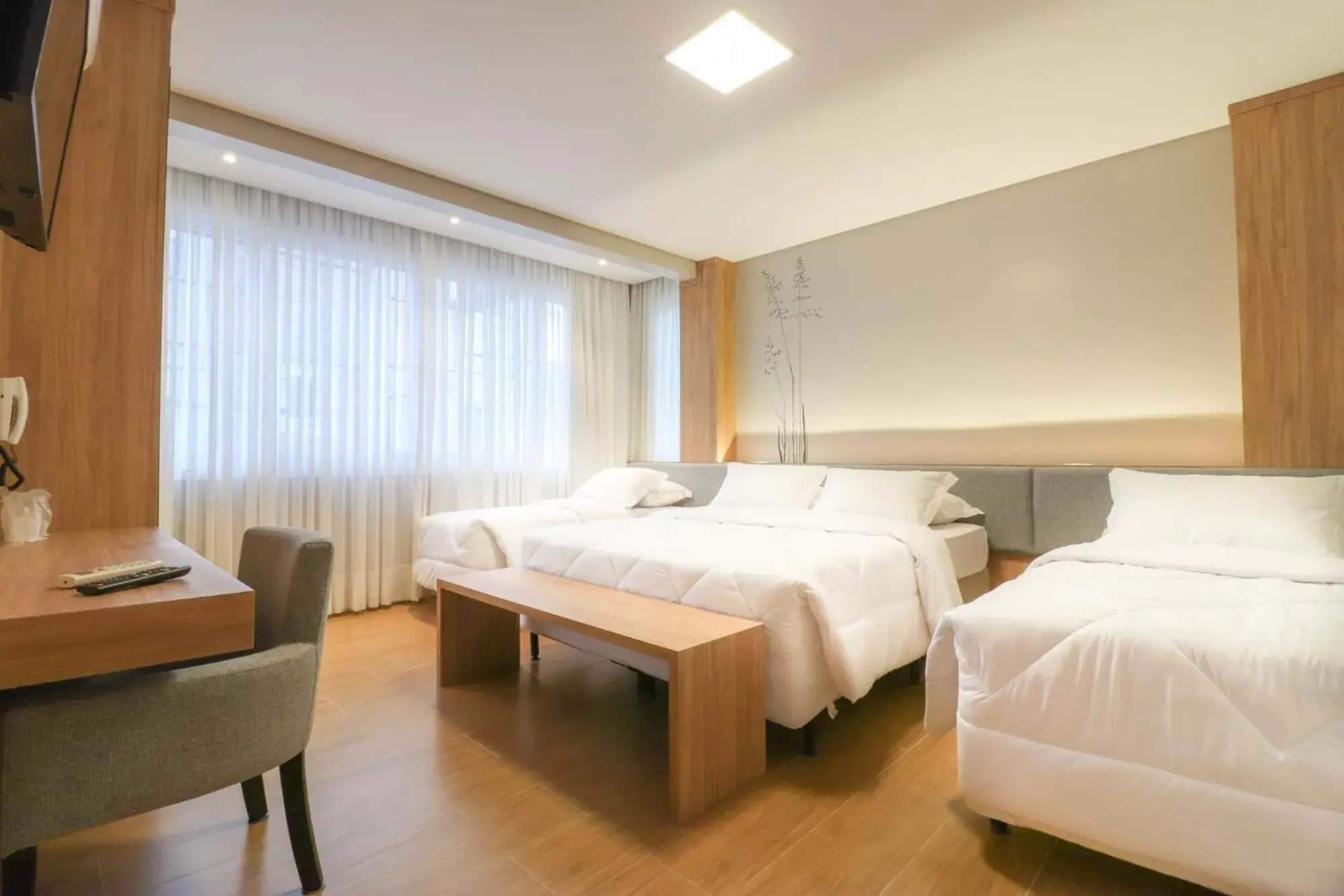 Deluxe Quadruple Room in Pousada Bella Viena Deluxe Quadruple Room in Pousada Bella Viena