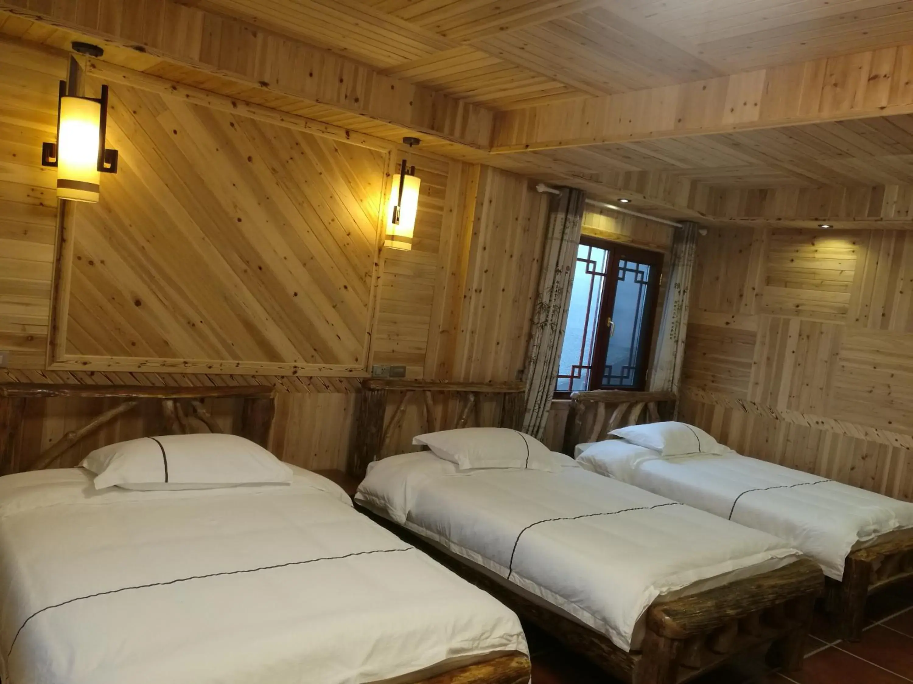 Triple Room with Balcony in Longji Holiday Hotel Triple Room with Balcony in Longji Holiday Hotel