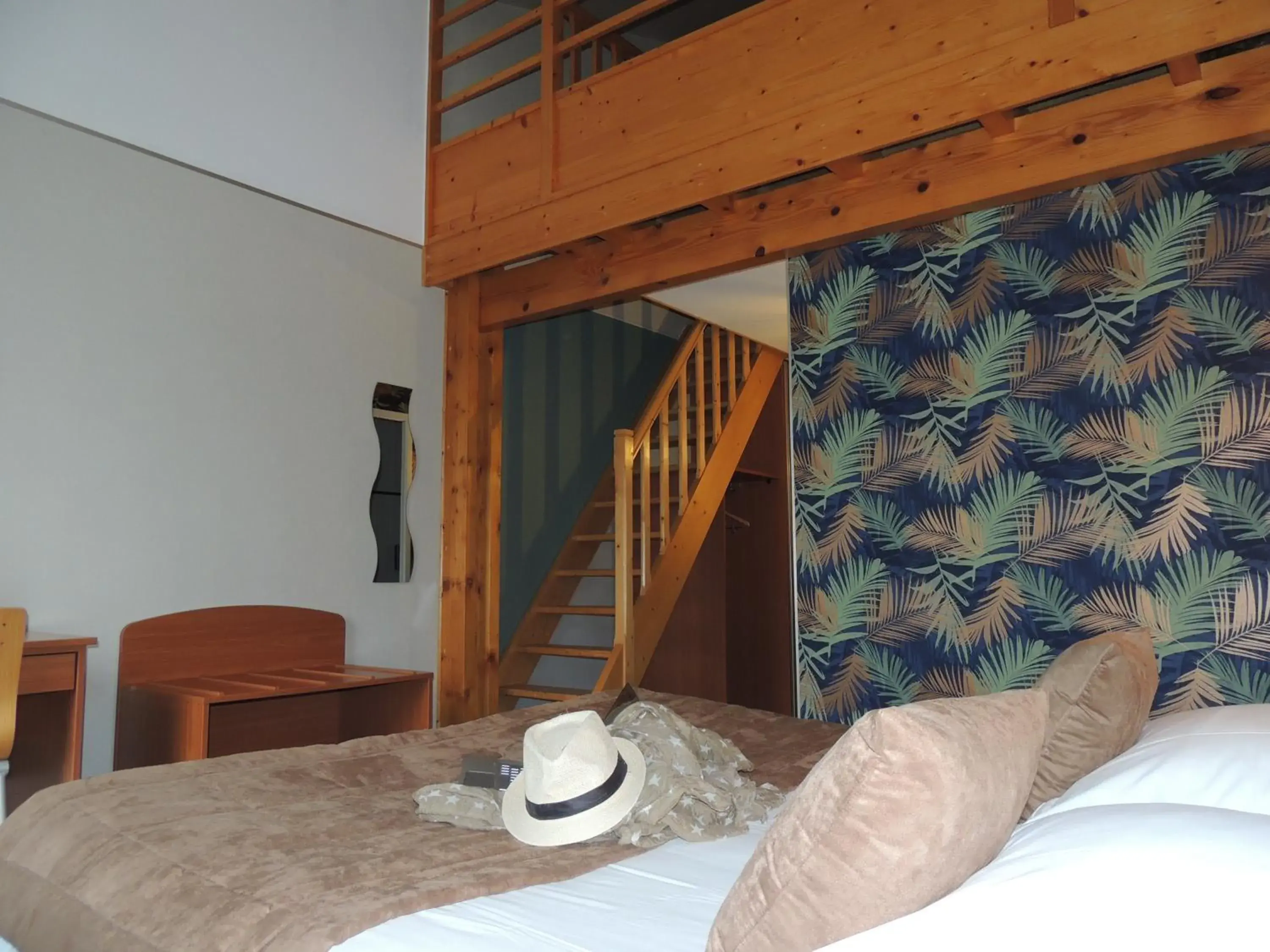 Family Room in LOGIS Hôtel LES 3 MARCHANDS Family Room in LOGIS Hôtel LES 3 MARCHANDS