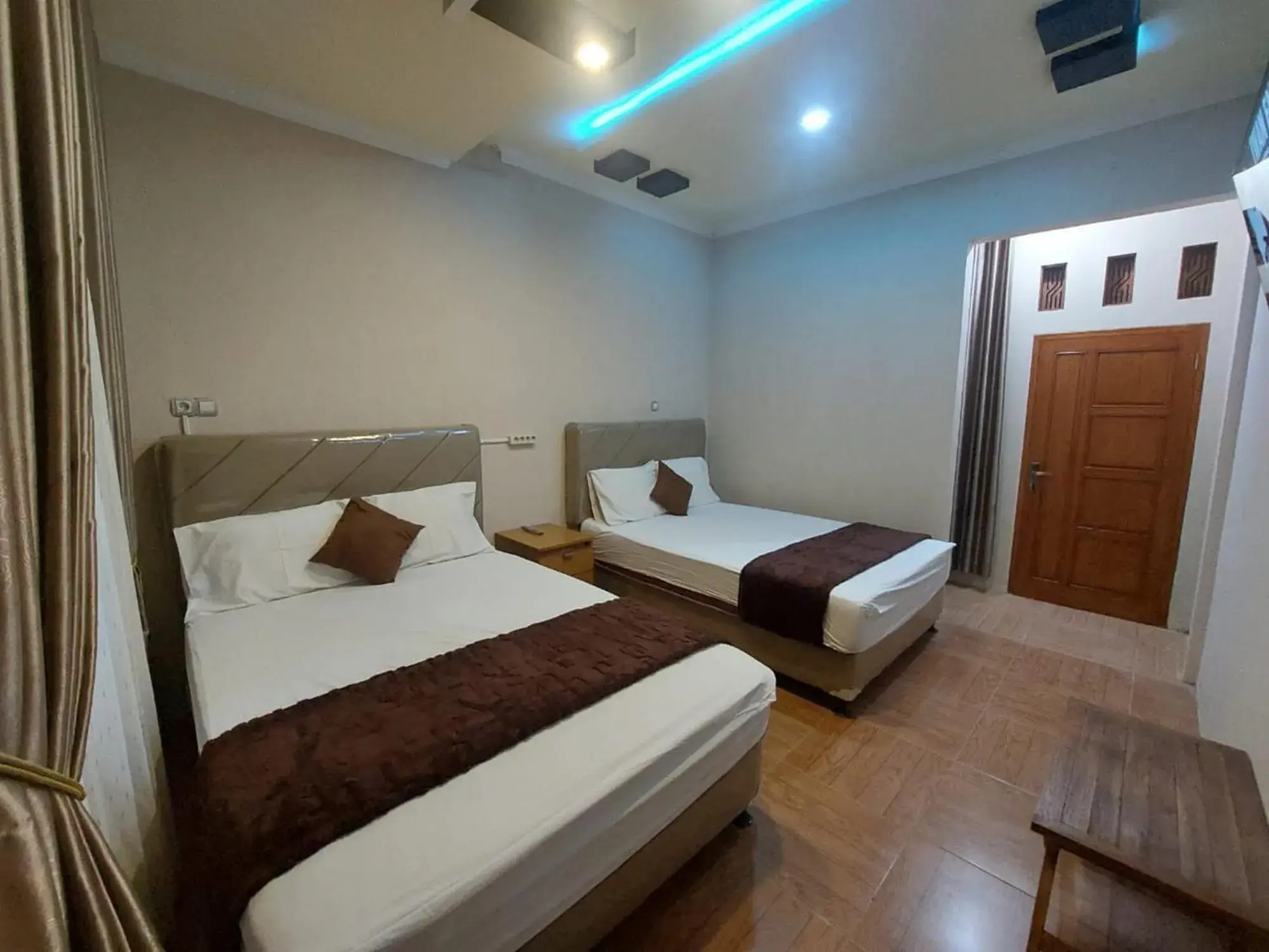 Family Room in Homestay Banteng Adventure Dieng Mitra RedDoorz Family Room in Homestay Banteng Adventure Dieng Mitra RedDoorz