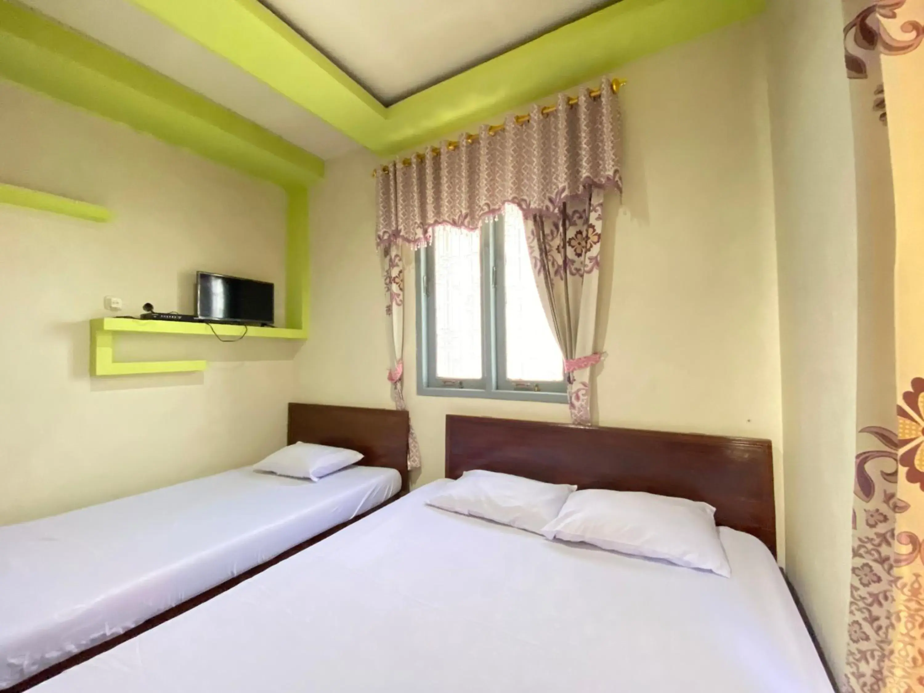 Family Room in Homestay Srikandi Syariah Dieng RedPartner Family Room in Homestay Srikandi Syariah Dieng RedPartner