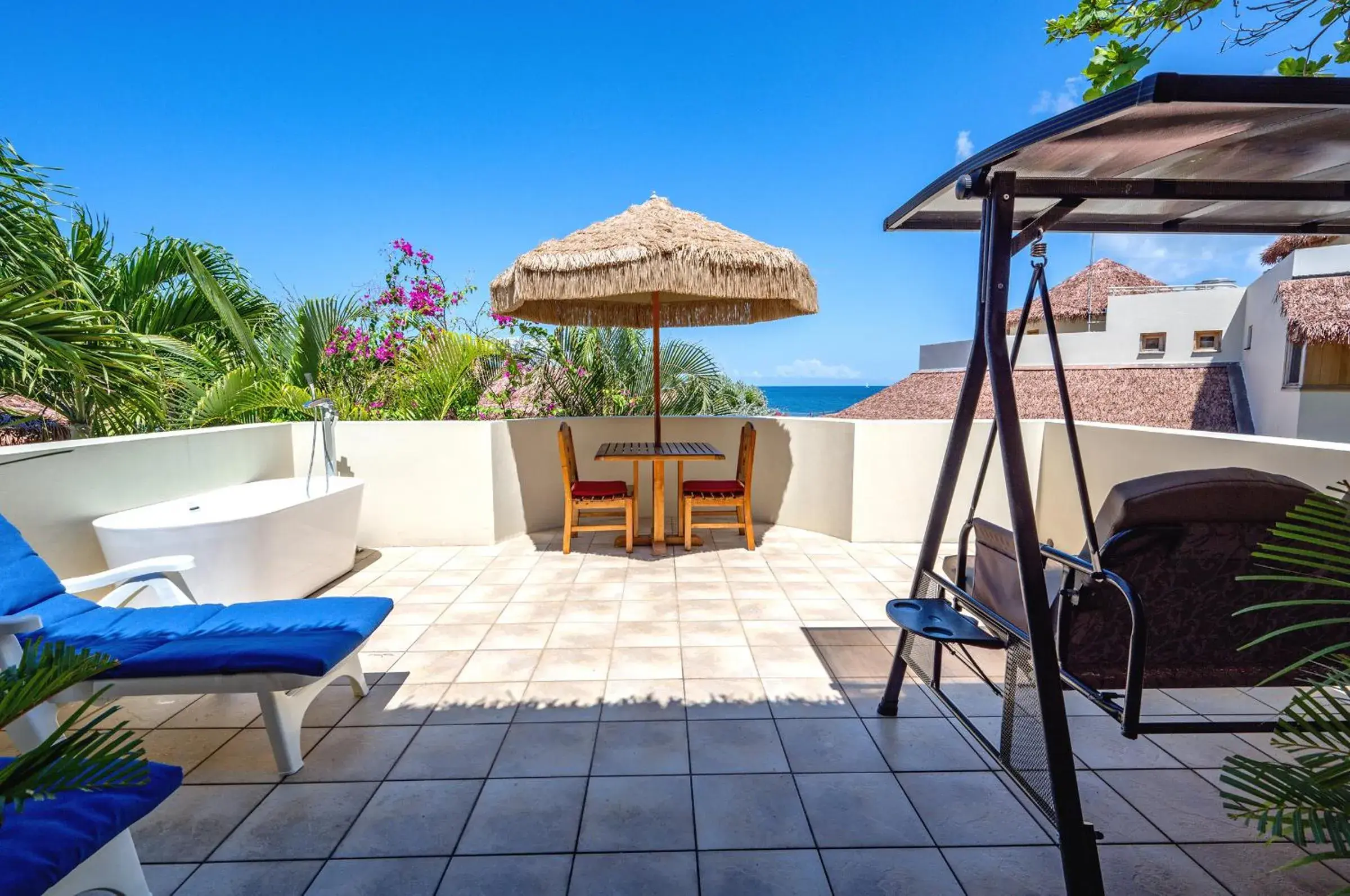 Deluxe Double Room with Balcony - single occupancy in Ocean Cliff Hotel Negril Limited - Adults Only Deluxe Double Room with Balcony - single occupancy in Ocean Cliff Hotel Negril Limited - Adults Only