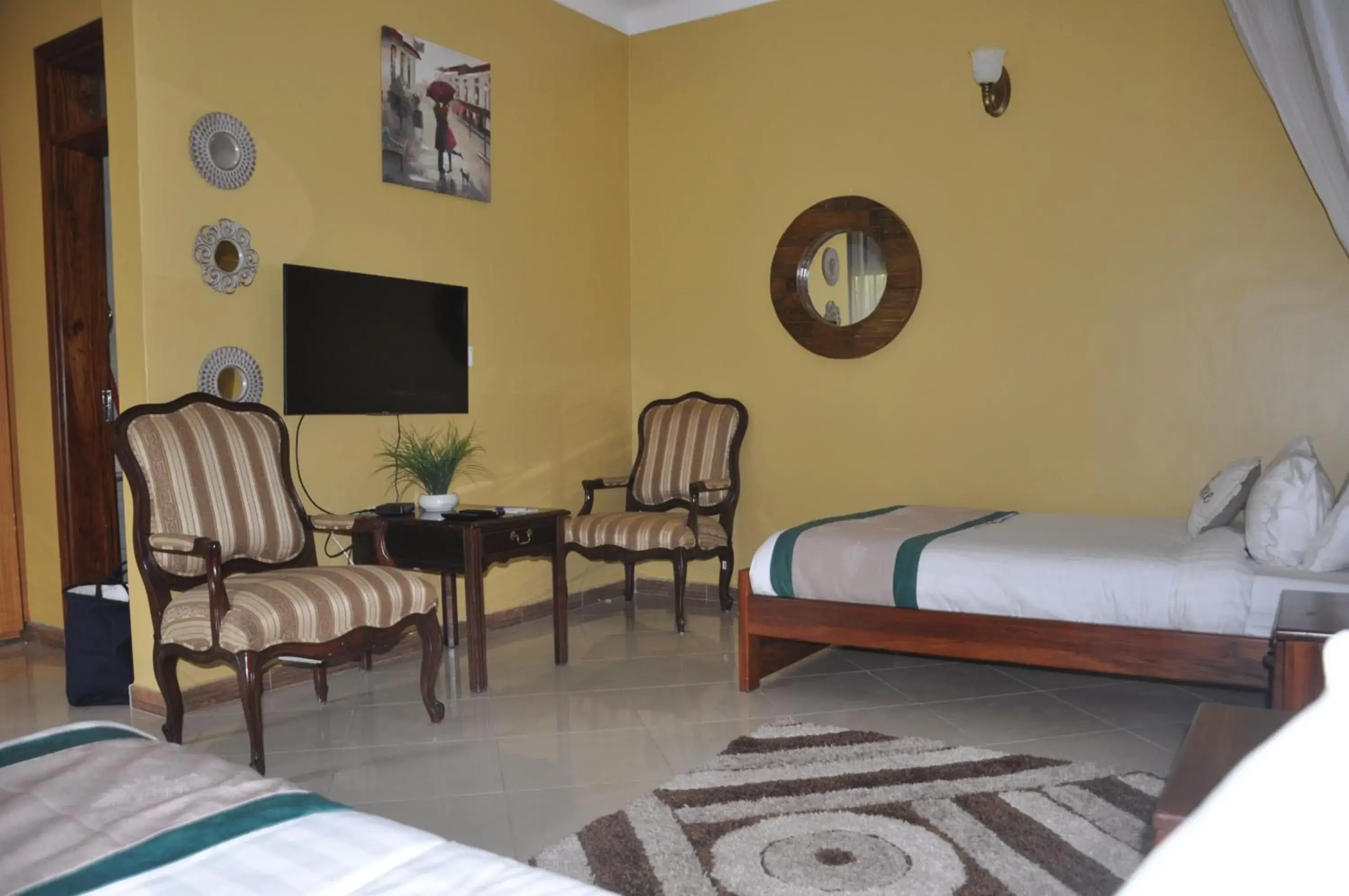 Twin Room - single occupancy in Home Bliss Hotel- Fort portal Uganda Twin Room - single occupancy in Home Bliss Hotel- Fort portal Uganda