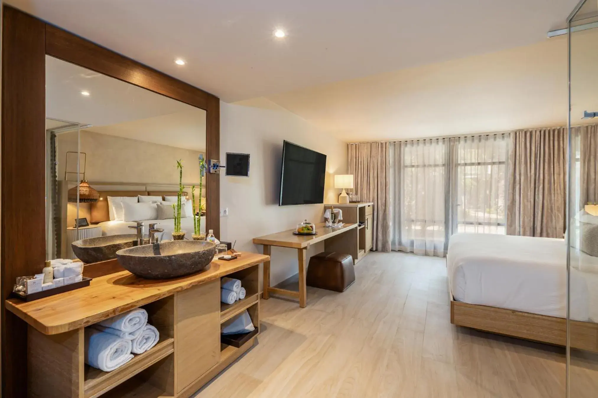 Junior Suite with Pool View King Beds in Zoetry Curacao Junior Suite with Pool View King Beds in Zoetry Curacao