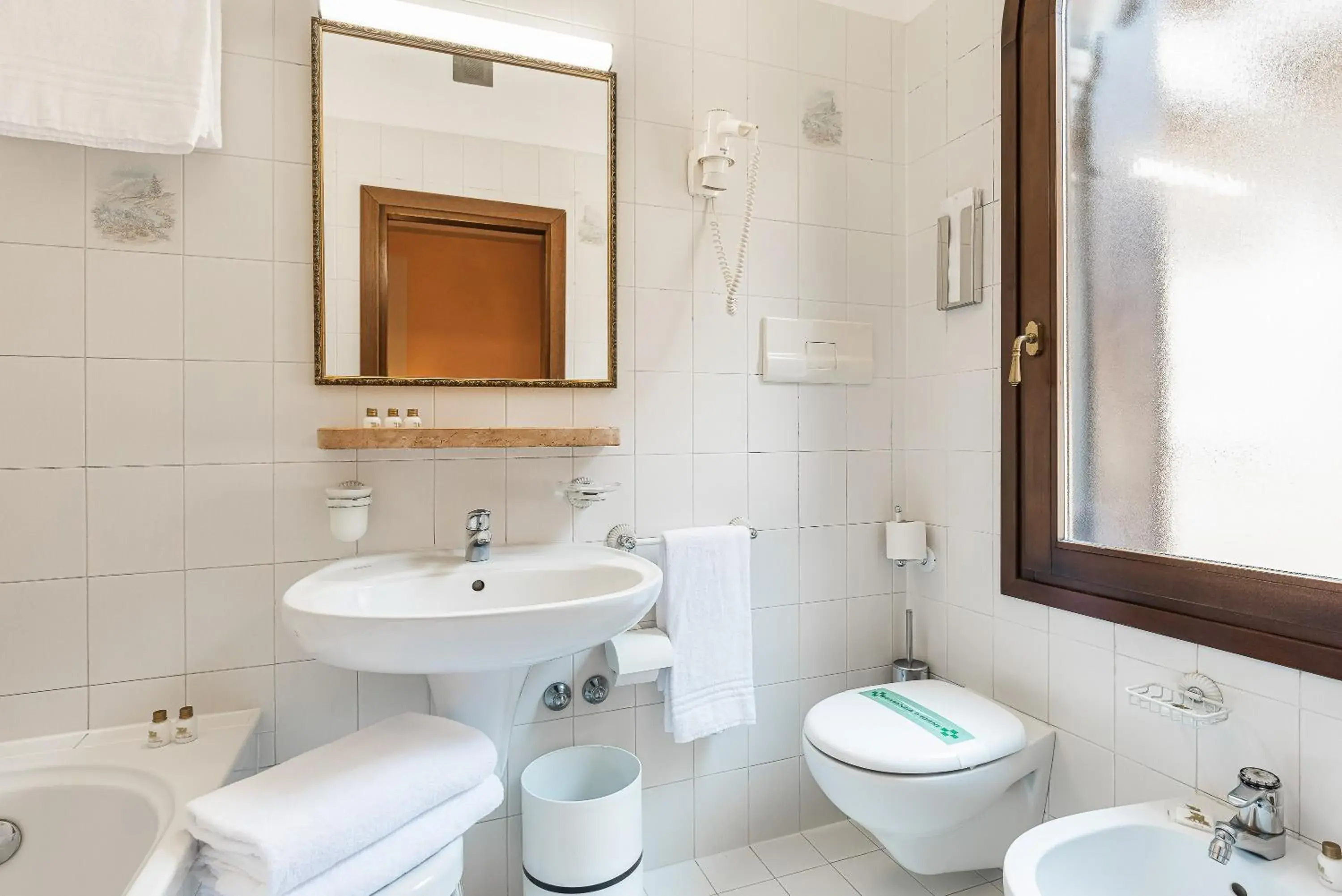 Quadruple Room in Hotel Marconi Quadruple Room in Hotel Marconi