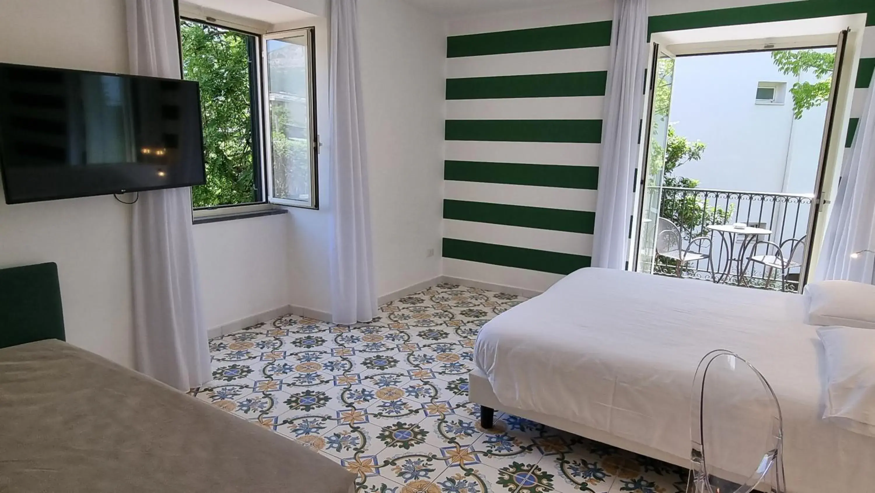 Classic Quadruple Room in Hotel Alpha Classic Quadruple Room in Hotel Alpha