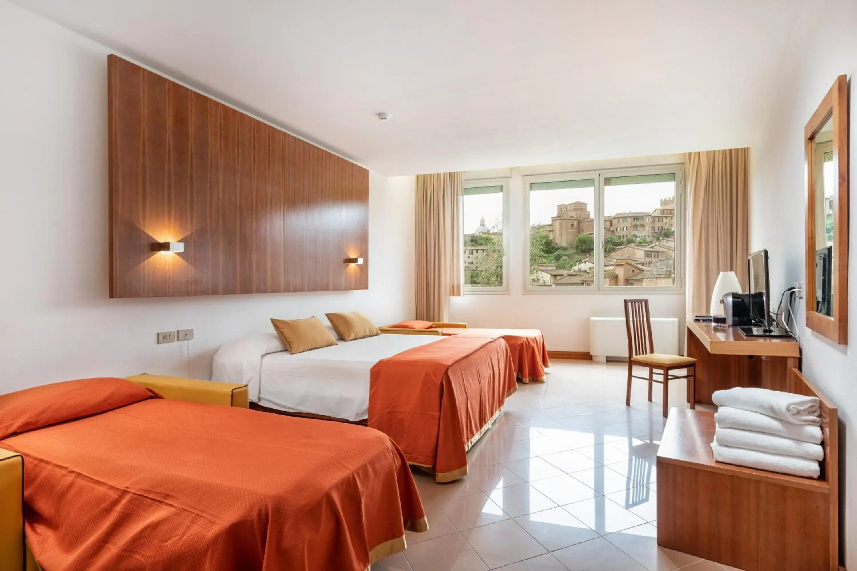 Superior Quadruple Room with City View in Hotel Minerva Superior Quadruple Room with City View in Hotel Minerva