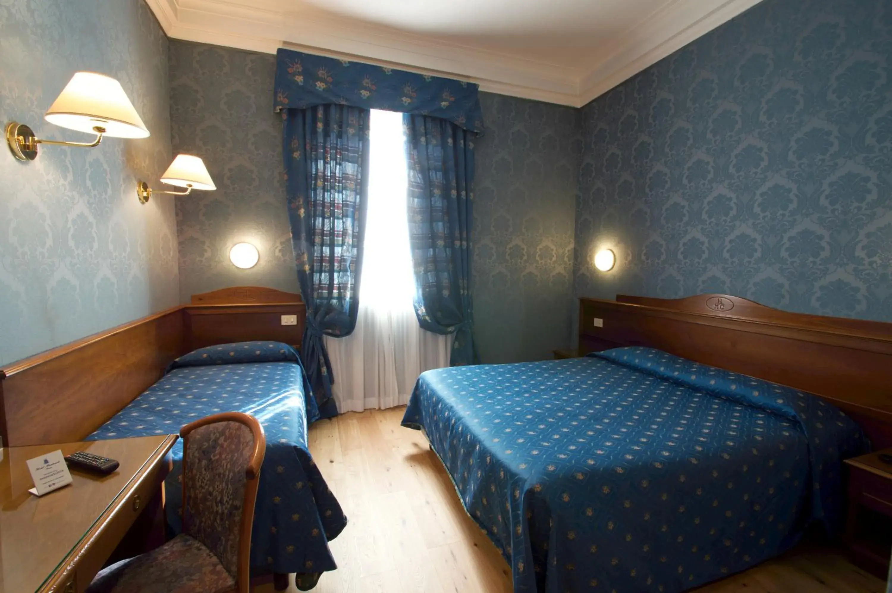 Triple Room in Hotel Montecarlo Triple Room in Hotel Montecarlo