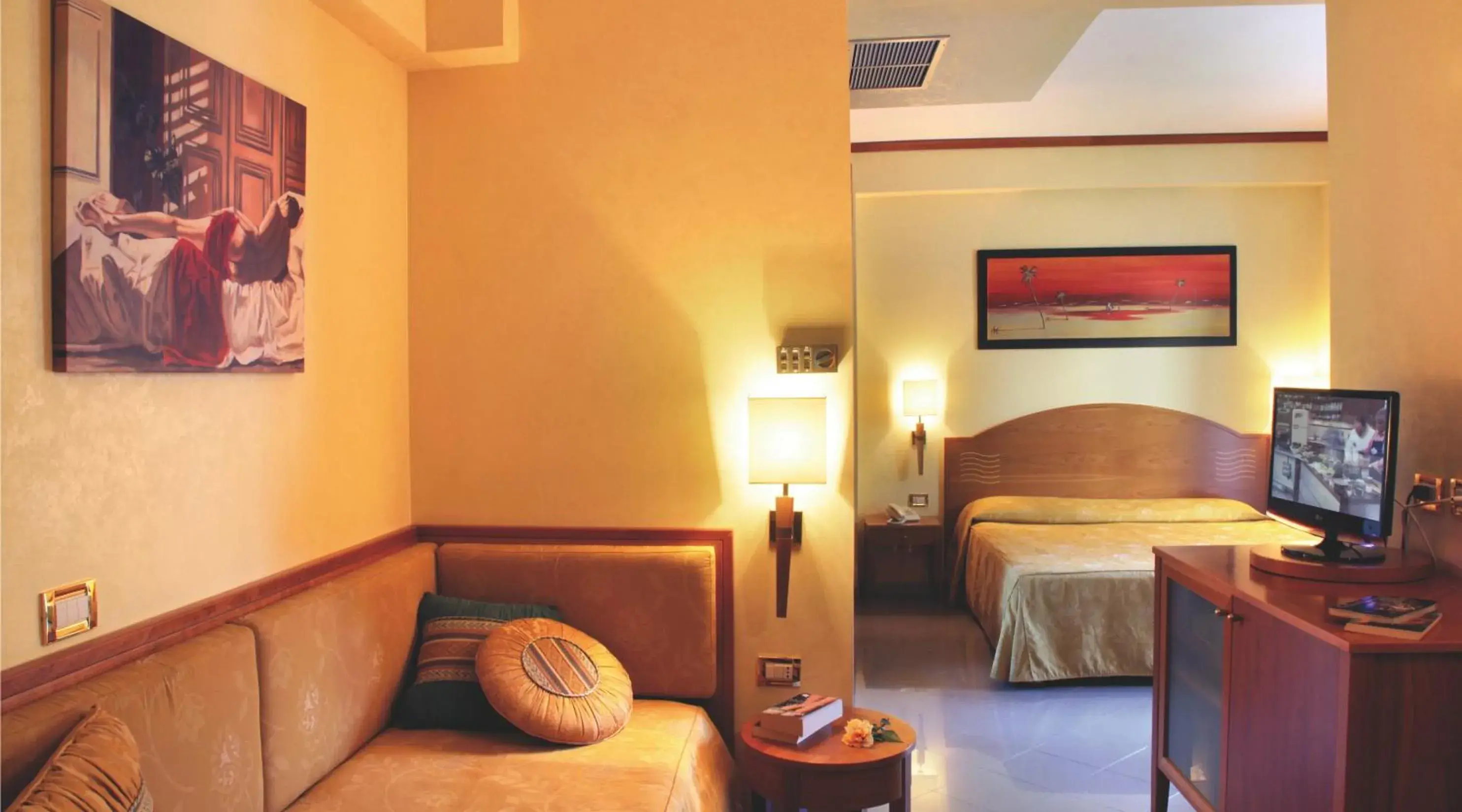 Quadruple Room in Hotel Tirreno Quadruple Room in Hotel Tirreno