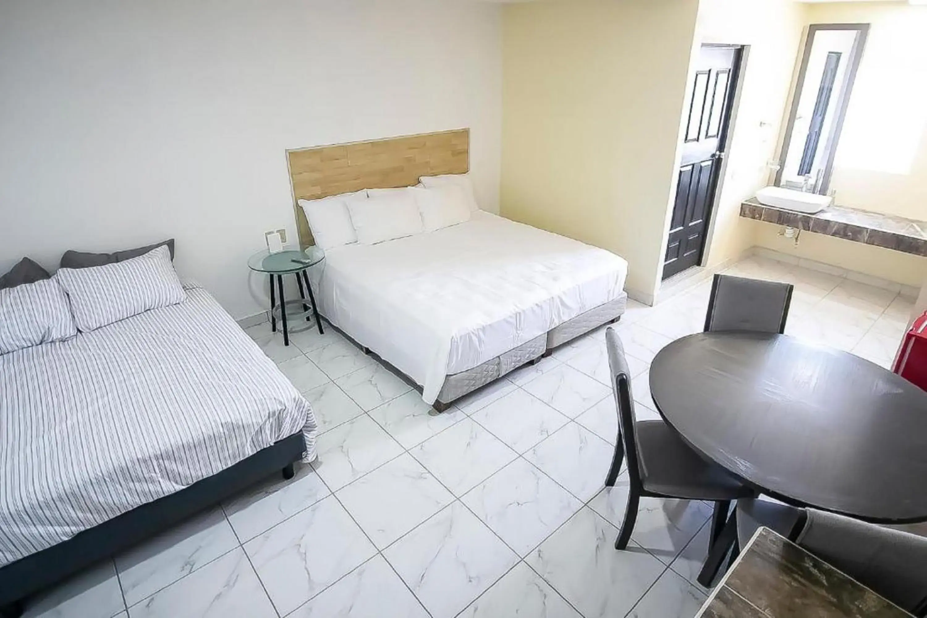 Standard Three beds in OYO Hotel Plaza Las Torres, Cabo San Lucas Standard Three beds in OYO Hotel Plaza Las Torres, Cabo San Lucas