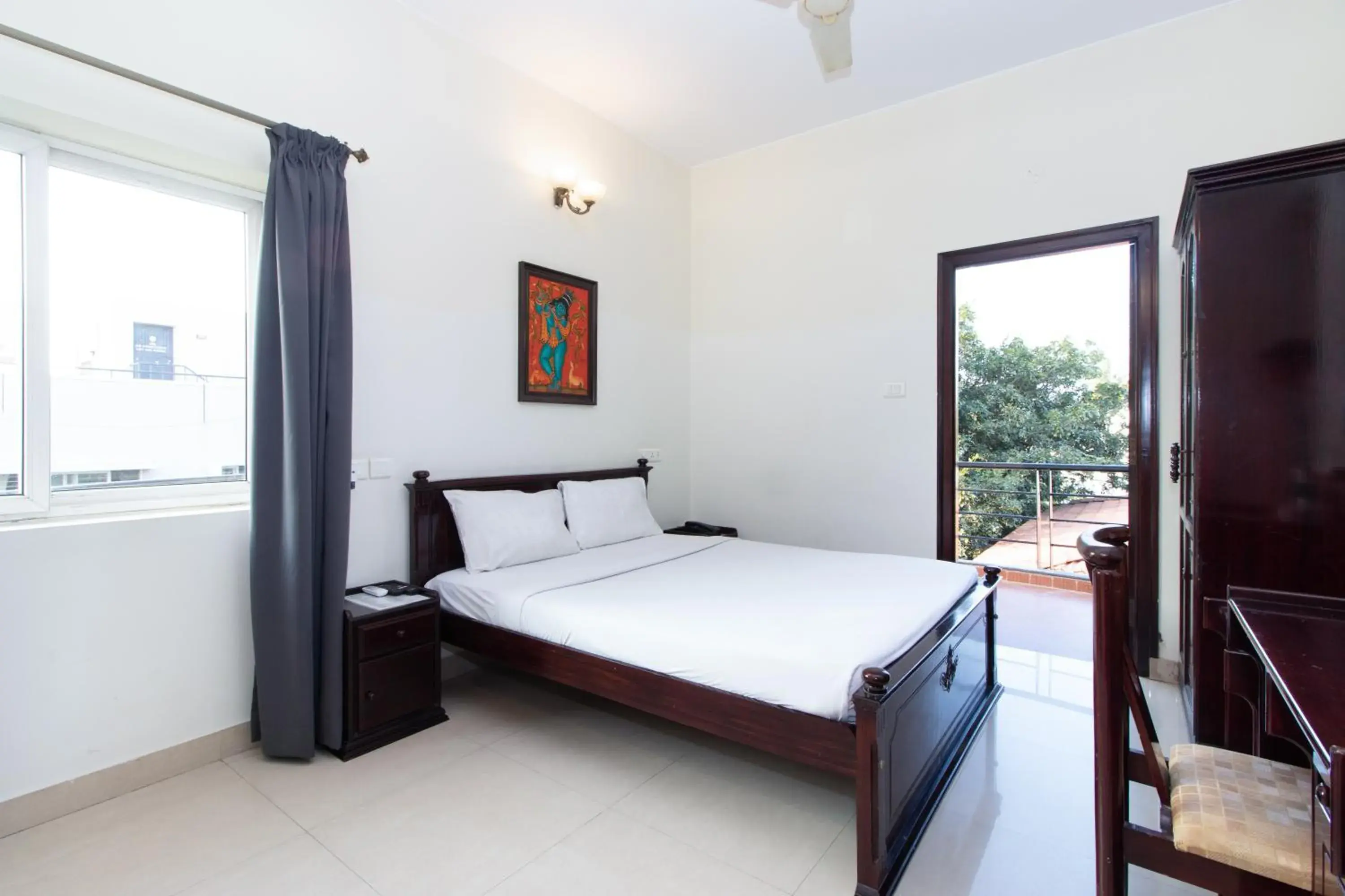Queen Room with Balcony - single occupancy in Sanctum Suites Indiranagar Bangalore Queen Room with Balcony - single occupancy in Sanctum Suites Indiranagar Bangalore