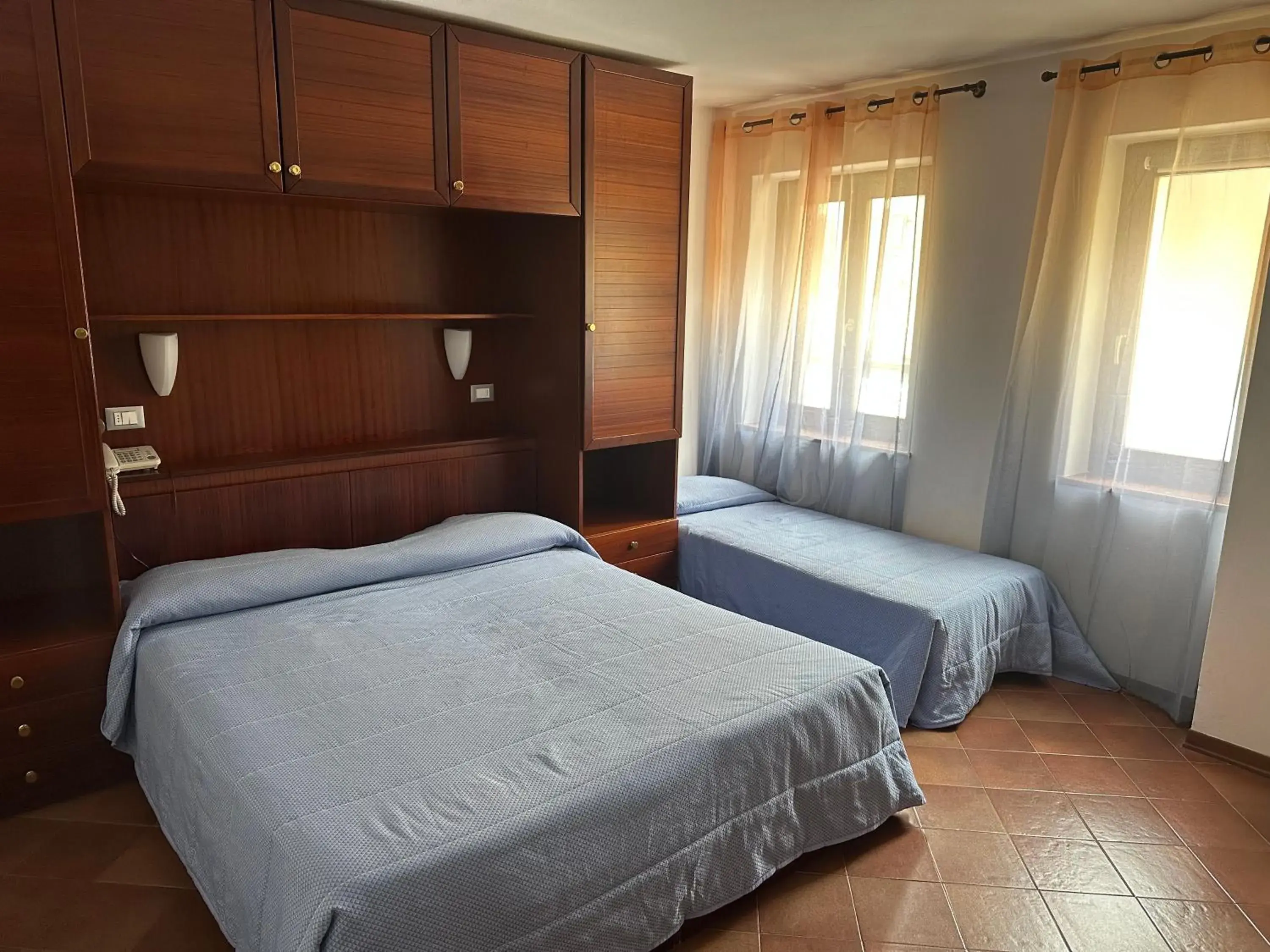 Comfort Triple Room in Hotel Alla città di Trieste Comfort Triple Room in Hotel Alla città di Trieste