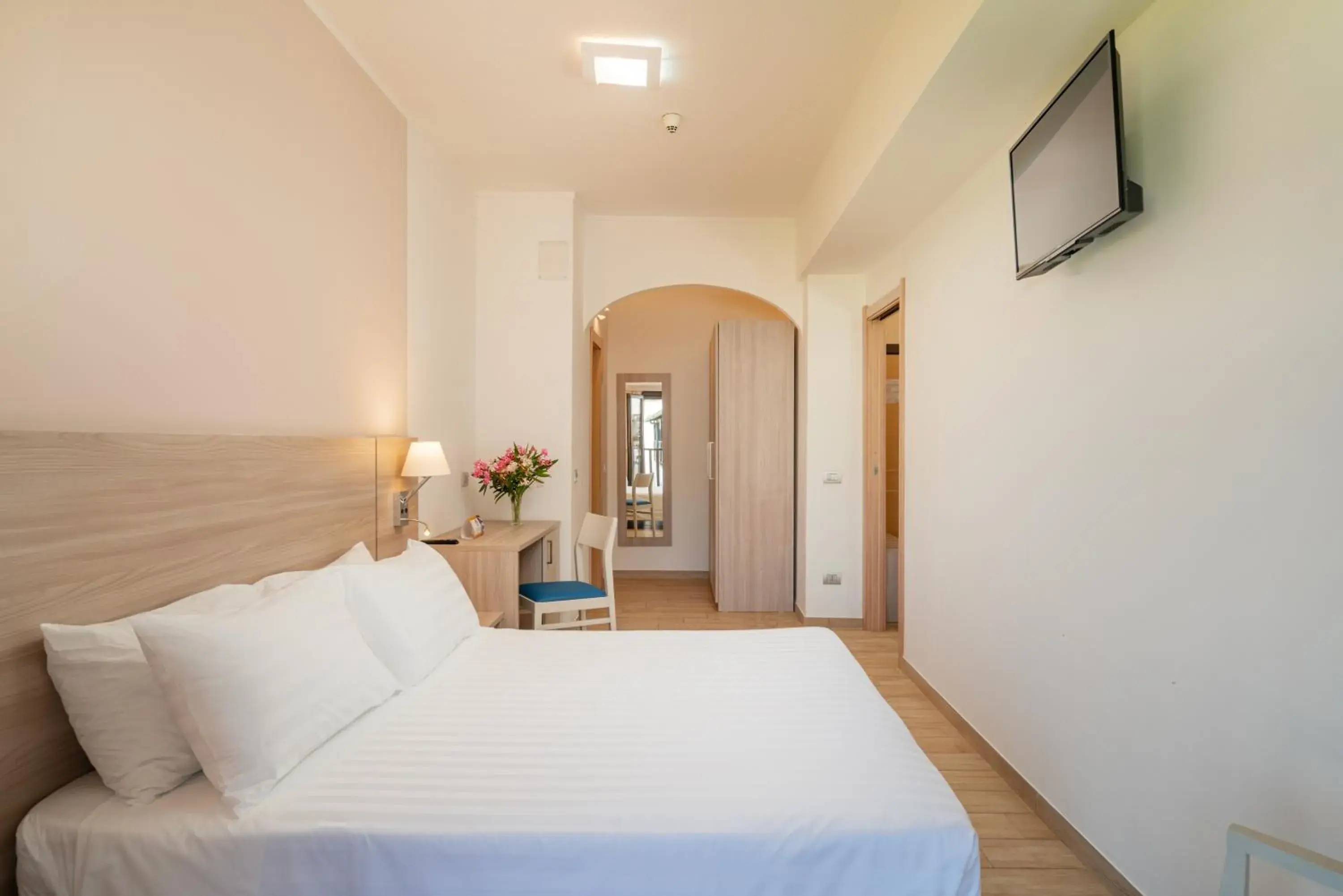 Family Room with Garden View in Hotel Portoconte Family Room with Garden View in Hotel Portoconte