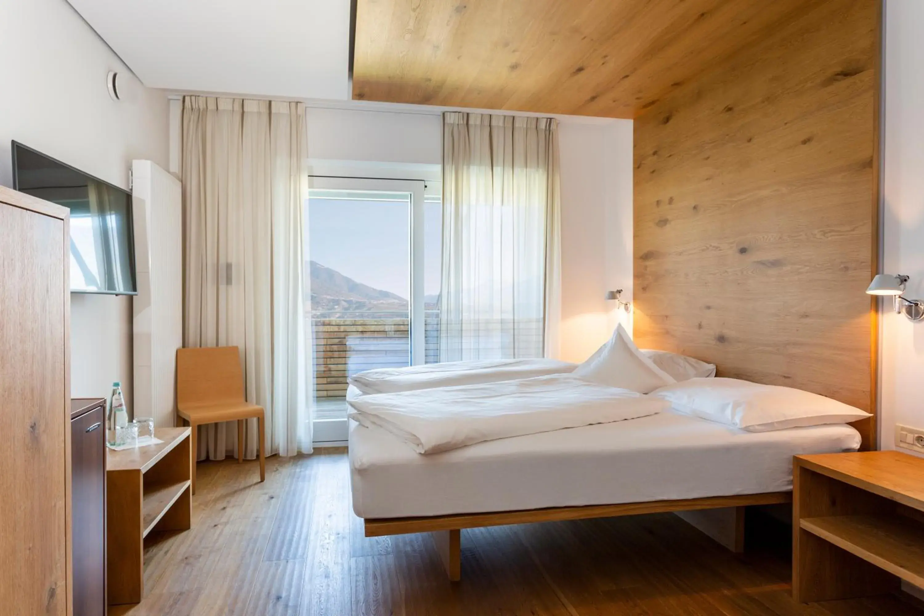Deluxe Double Room with Balcony - single occupancy in Bio & Wellnesshotel Pazeider - Healing Garden above Meran Deluxe Double Room with Balcony - single occupancy in Bio & Wellnesshotel Pazeider - Healing Garden above Meran
