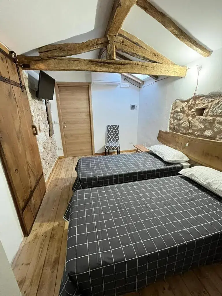 Twin Room - single occupancy in DOMUS VELA Twin Room - single occupancy in DOMUS VELA