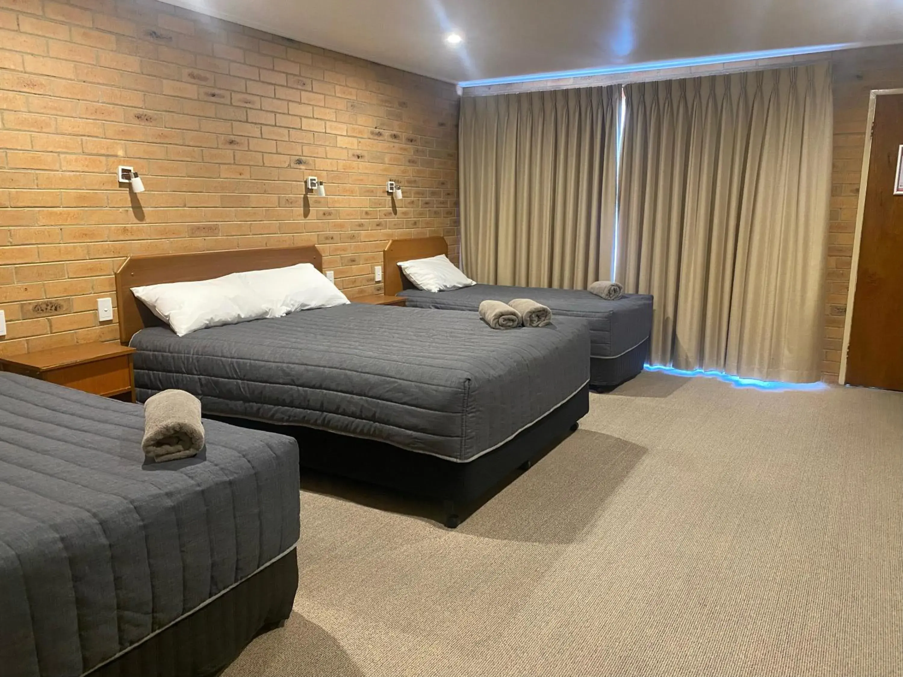 Deluxe Family Room (1 Queen, 2 Singles) in Quays Motel San Remo Deluxe Family Room (1 Queen, 2 Singles) in Quays Motel San Remo