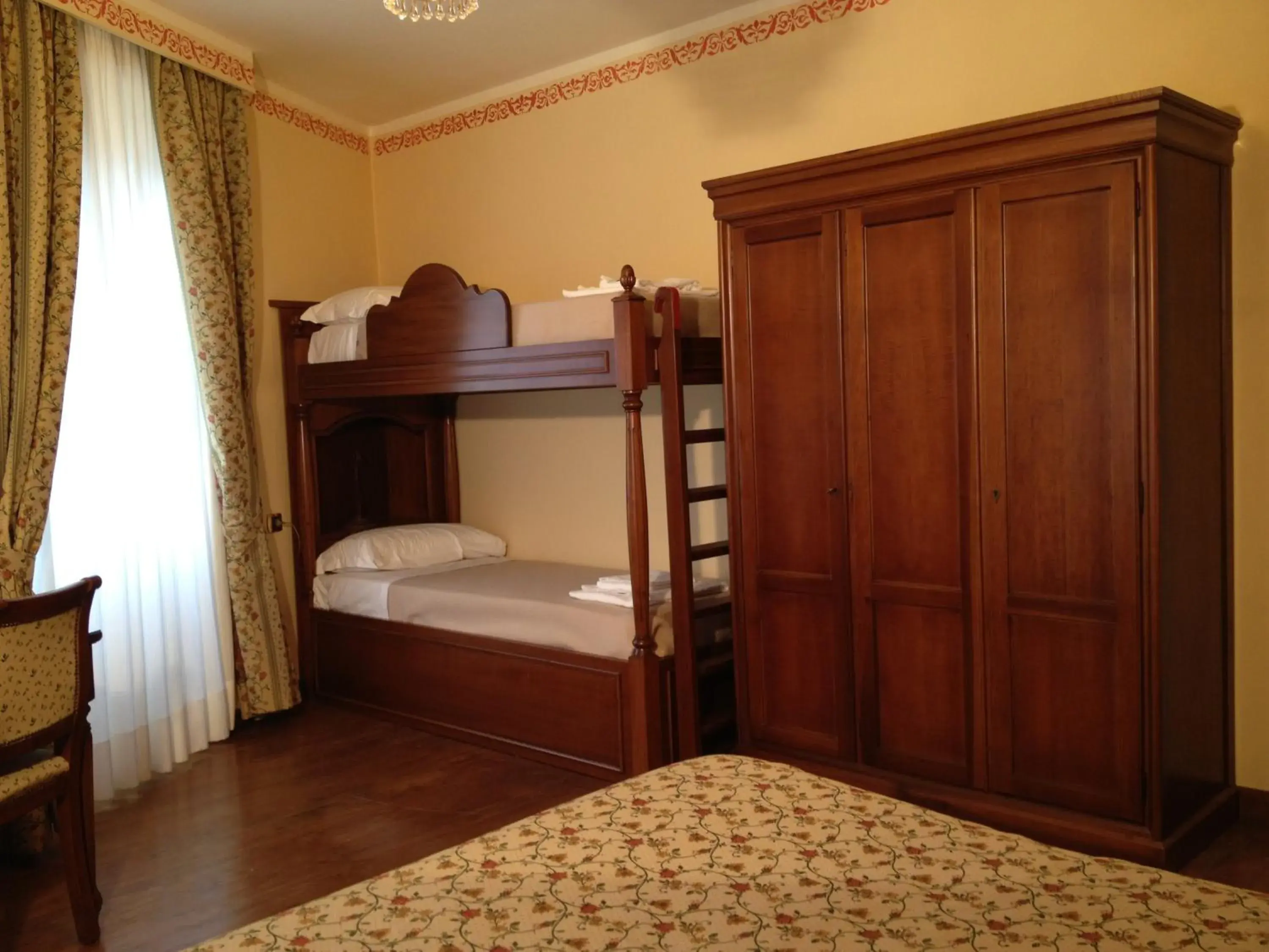 Quadruple Room in La Dependance Quadruple Room in La Dependance