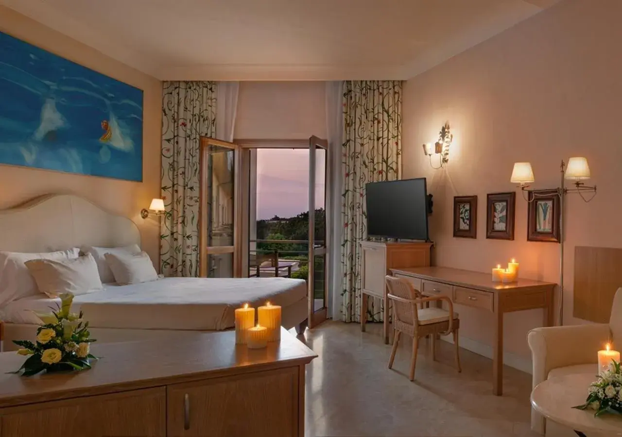 Superior Triple Room with Partial Sea View in Tombolo Talasso Resort Superior Triple Room with Partial Sea View in Tombolo Talasso Resort