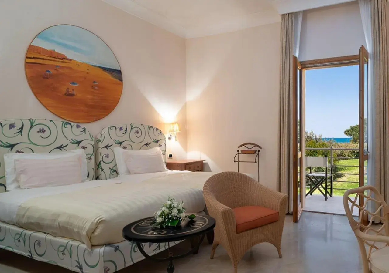 Superior Double or Twin Room with Partial Sea View in Tombolo Talasso Resort Superior Double or Twin Room with Partial Sea View in Tombolo Talasso Resort
